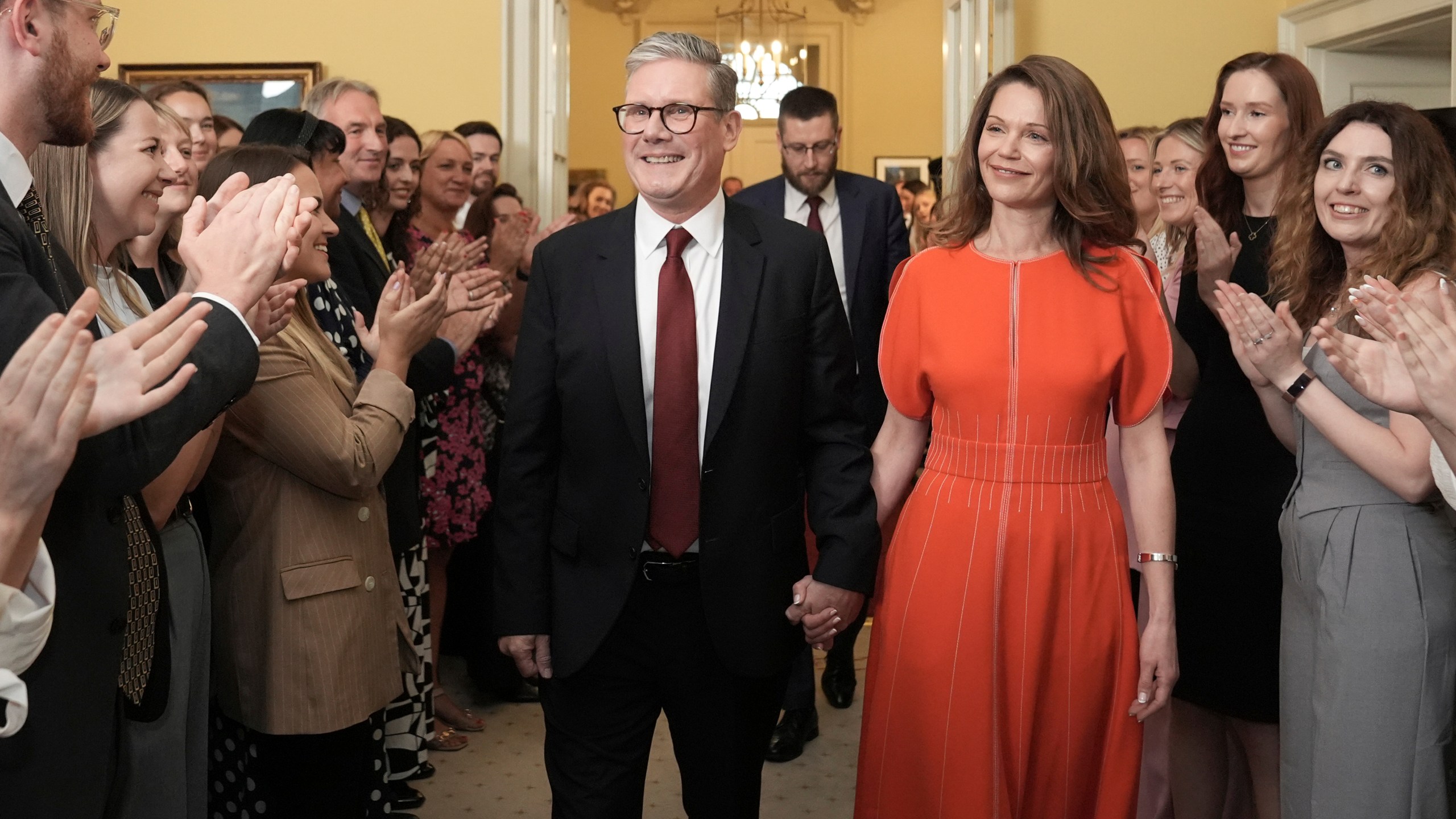 FILE - Britain's newly elected Prime Minister Keir Starmer and his wife Victoria enter his official London residence at No 10 Downing Street for the first time after the Labour Party won a landslide victory in the 2024 general election, in London, Friday July 5, 2024. After a few hours of sleep to shake off a night of celebration and an audience with the king, Keir Starmer will step through the front door of 10 Downing St. for the first time as prime minister on Friday. (Stefan Rousseau/Pool Photo via AP, File)