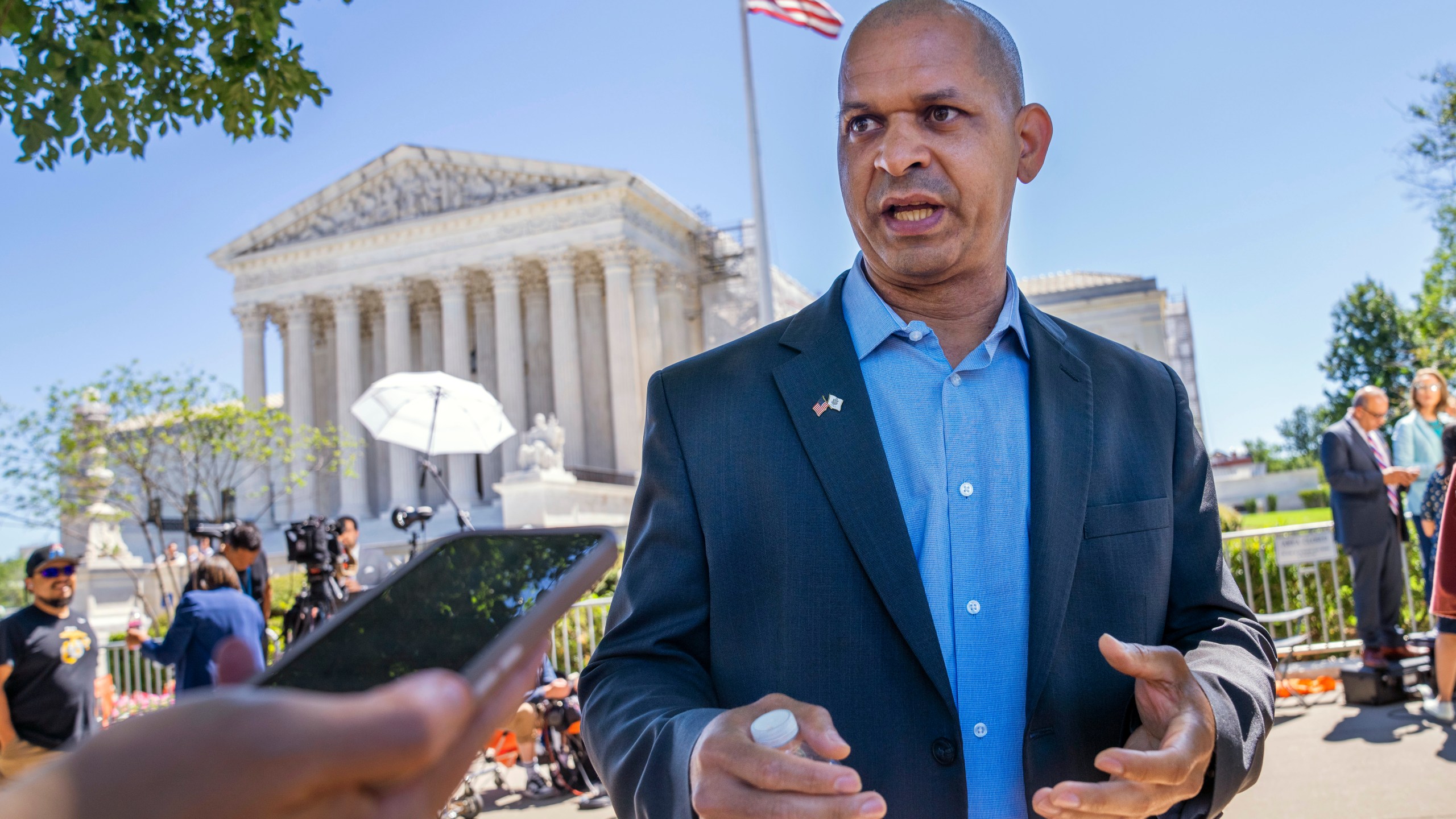 FILE - Former U.S. Capitol Police Sgt. Aquilino Gonell, who defended the Capitol on Jan. 6, is interviewed outside of the Supreme Court, July 1, 2024, after the court decision o the immunity case of former President Donald Trump, in Washington. (AP Photo/Jacquelyn Martin, File)