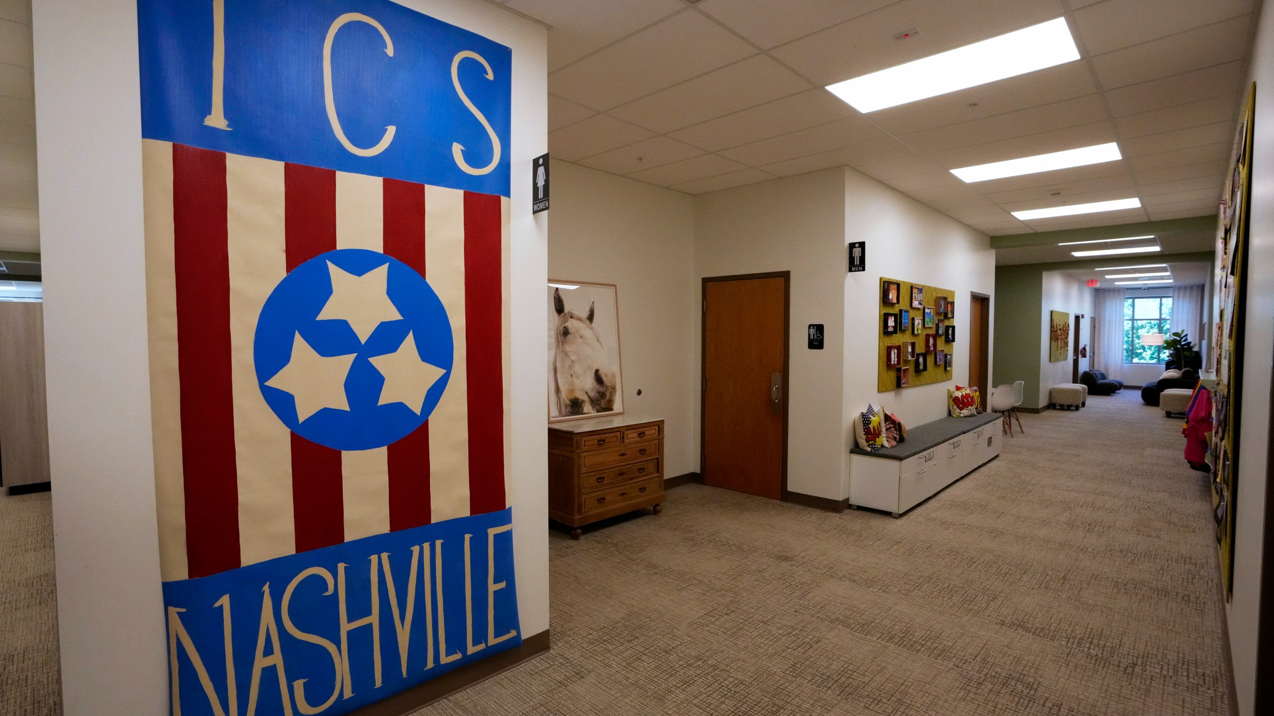 FILE - A large painting decorates a remodeled hallway in The Covenant School Tuesday, June 25, 2024, in Nashville, Tenn. The writings of a person who killed three 9-year-olds and three adults at a private Christian elementary school in Nashville last year cannot be released to the public. A Nashville judge ruled on Thursday, July 5, 2024, that The Covenant School children and parents hold a copyright to the documents given to them by the shooter's parents.(AP Photo/Mark Humphrey, File)