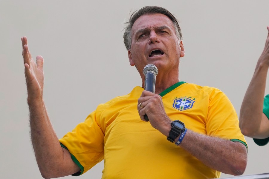 FILE - Former President Jair Bolsonaro addresses supporters during a rally in Sao Paulo, Brazil, Feb. 25, 2024. Brazilian police indicted Bolsonaro on Thursday, July 4, 2024, for money laundering and criminal association, sources say. (AP Photo/Andre Penner, File)
