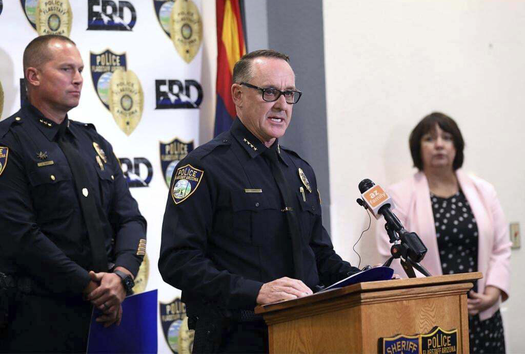 Flagstaff Police Chief Sean Connolly announces a conviction in the disappearance and death of Kelly Paduchowski, in Flagstaff, Ariz., Friday, July 5, 2024. The woman's husband, Daniel Paduchowski, pleaded guilty to second-degree murder in her death. (Hattie Loper/Arizona Daily Sun via AP)