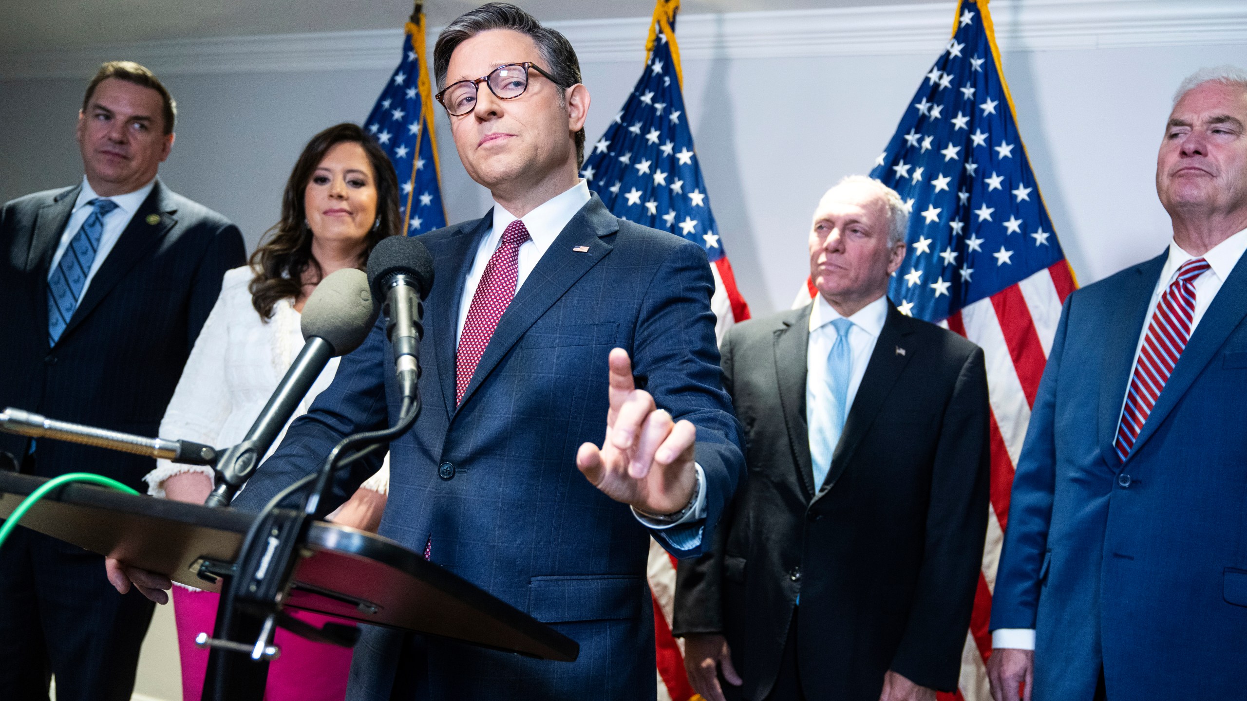 Speaker of the House Mike Johnson, R-La., conducts a news conference at the Republican National Committee after a meeting with Republican presidential candidate former President Donald Trump and the House Republican Conference on Thursday, June 13, 2024. Also appearing from left are, Rep. Richard Hudson, R-N.C., chairman of the National Republican Congressional Committee, House Republican Conference Chair Elise Stefanik, R-N.Y., House Majority Leader Steve Scalise, R-La., and House Majority Whip Tom Emmer, R-Minn. (Tom Williams/Pool via AP)