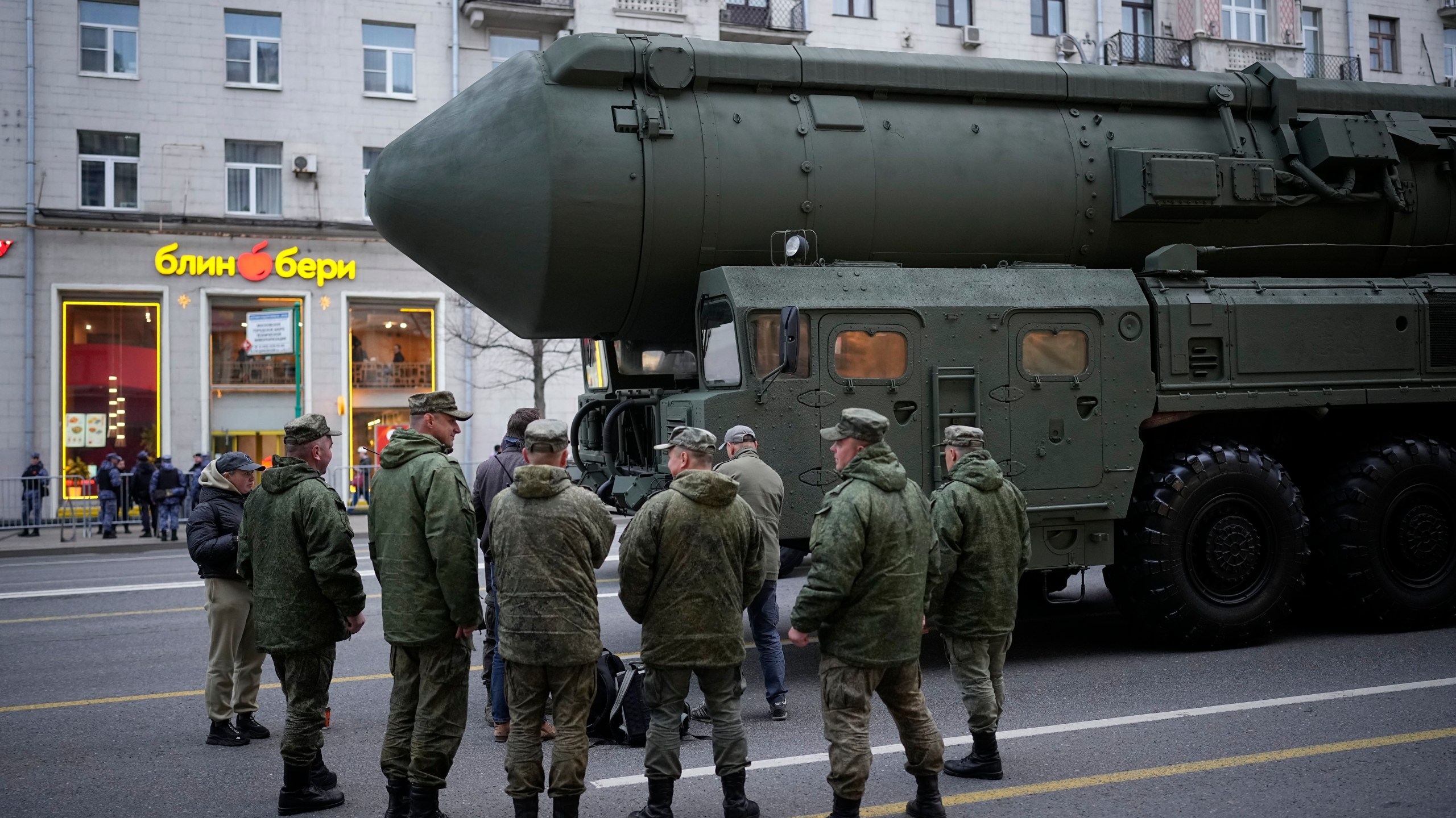 FILE - Soldiers stand next to a Russian RS-24 Yars ballistic missile parked along Tverskaya street prior to a rehearsal for the Victory Day military parade in Moscow, on Thursday, May 2, 2024. (AP Photo/Alexander Zemlianichenko, File)