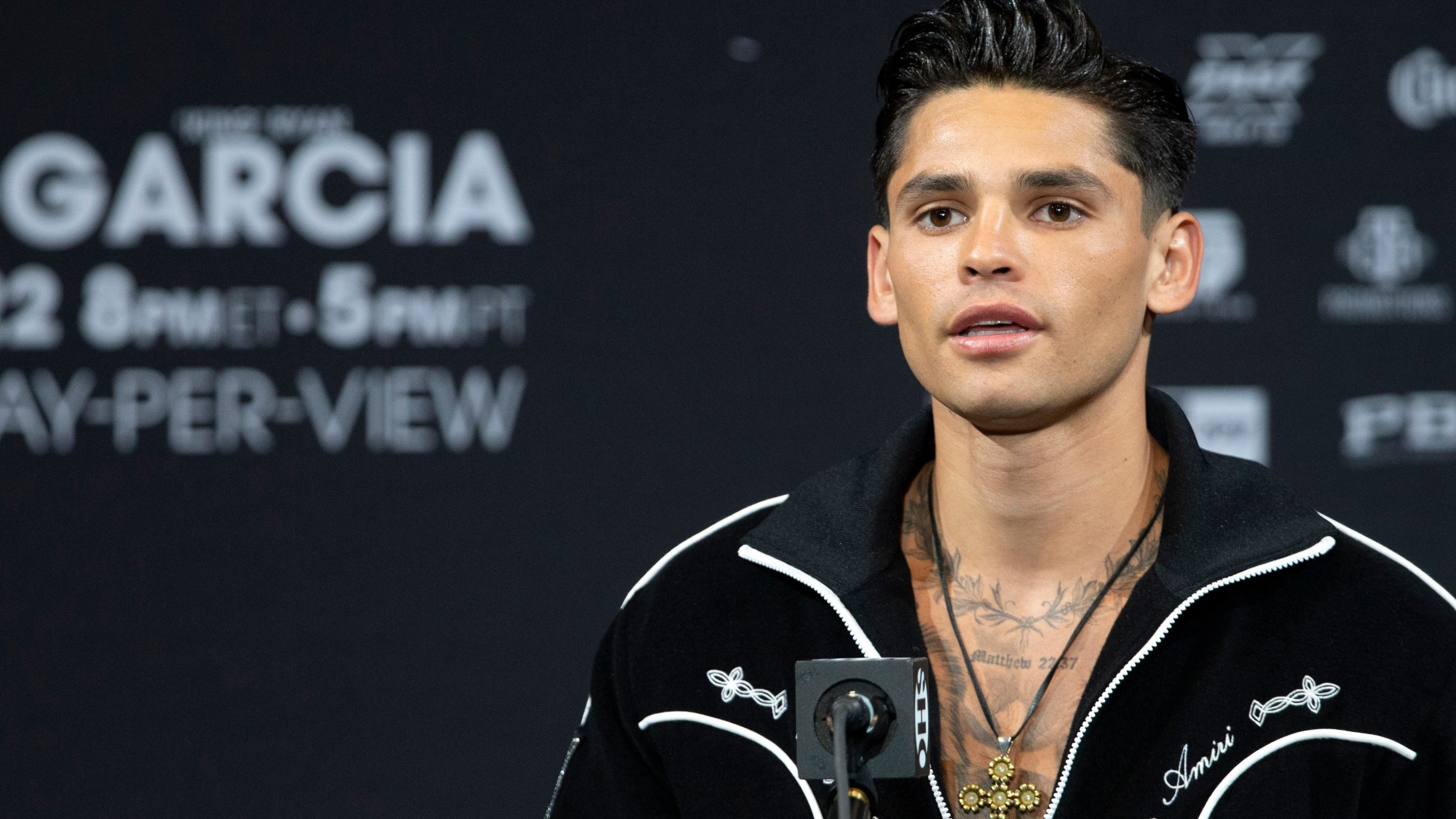 FILE - Super lightweight boxer Ryan Garcia speaks during a news conference at the MGM Grand hotel-casino Thursday, April 20, 2023, in Las Vegas. Ryan Garcia was expelled by the World Boxing Council on Thursday after he repeatedly used racial slurs against Black people and disparaged Muslims in comments livestreamed on social media. (Steve Marcus/Las Vegas Sun via AP, File)