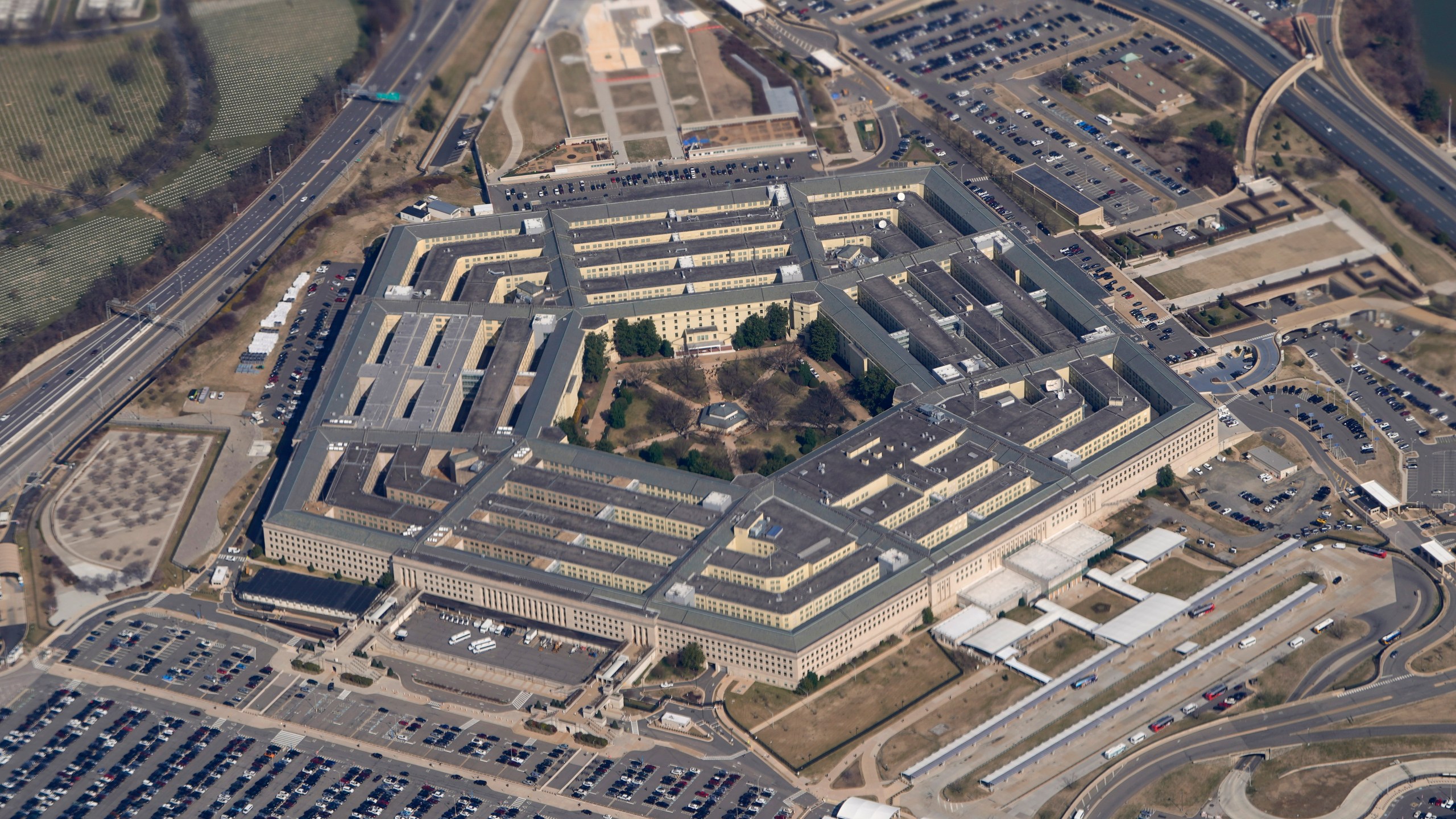 FILE - The Pentagon is seen from Air Force One as it flies over Washington, March 2, 2022. World UFO Day is being celebrated amid a surge in sightings and government studies on unidentified flying objects. (AP Photo/Patrick Semansky, File)