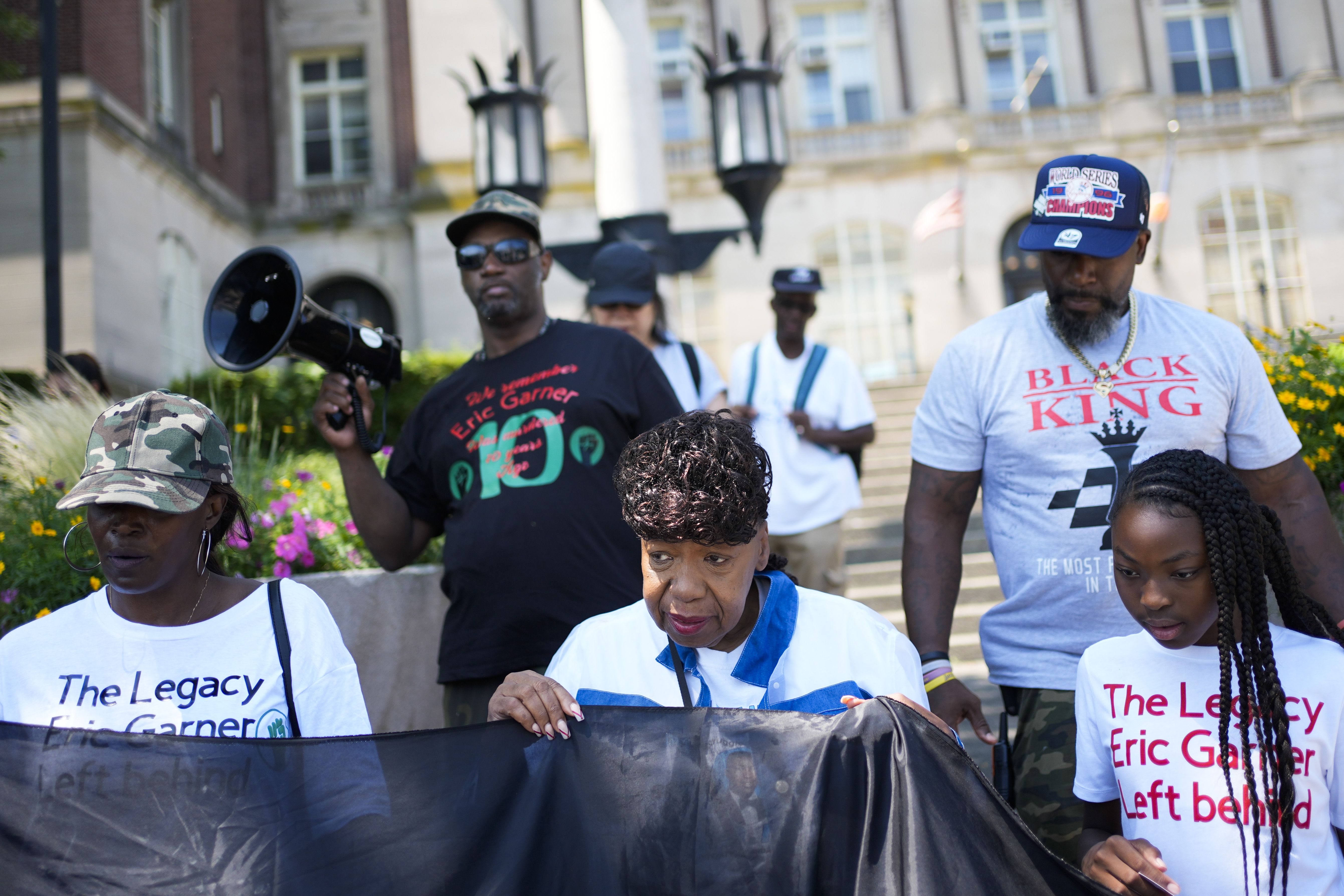 Gwen Carr, mother of Eric Garner, center front, marches with family and supporters during a commemoration of Garner's death in the Staten Island borough of New York, Wednesday, July 17, 2024. Wednesday marks 10 years since the death of Eric Garner at the hands of New York City police officers made "I can't breathe" a rallying cry. (AP Photo/Seth Wenig)