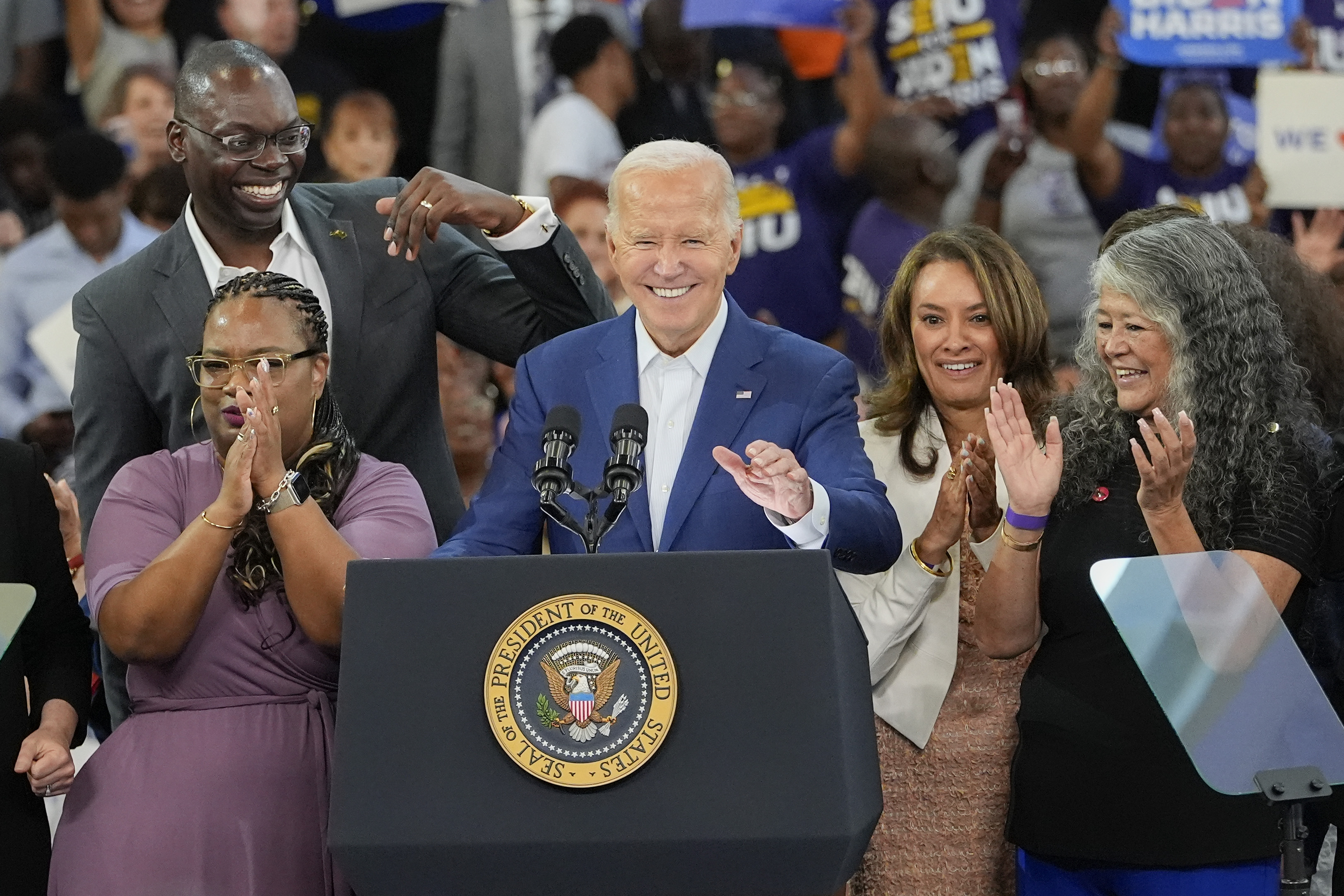 President Joe Biden smiles while delivering remarks at Renaissance High School In Detroit during a campaign event, Friday, July 12, 2024 in Detroit. (AP Photo/Carlos Osorio)
