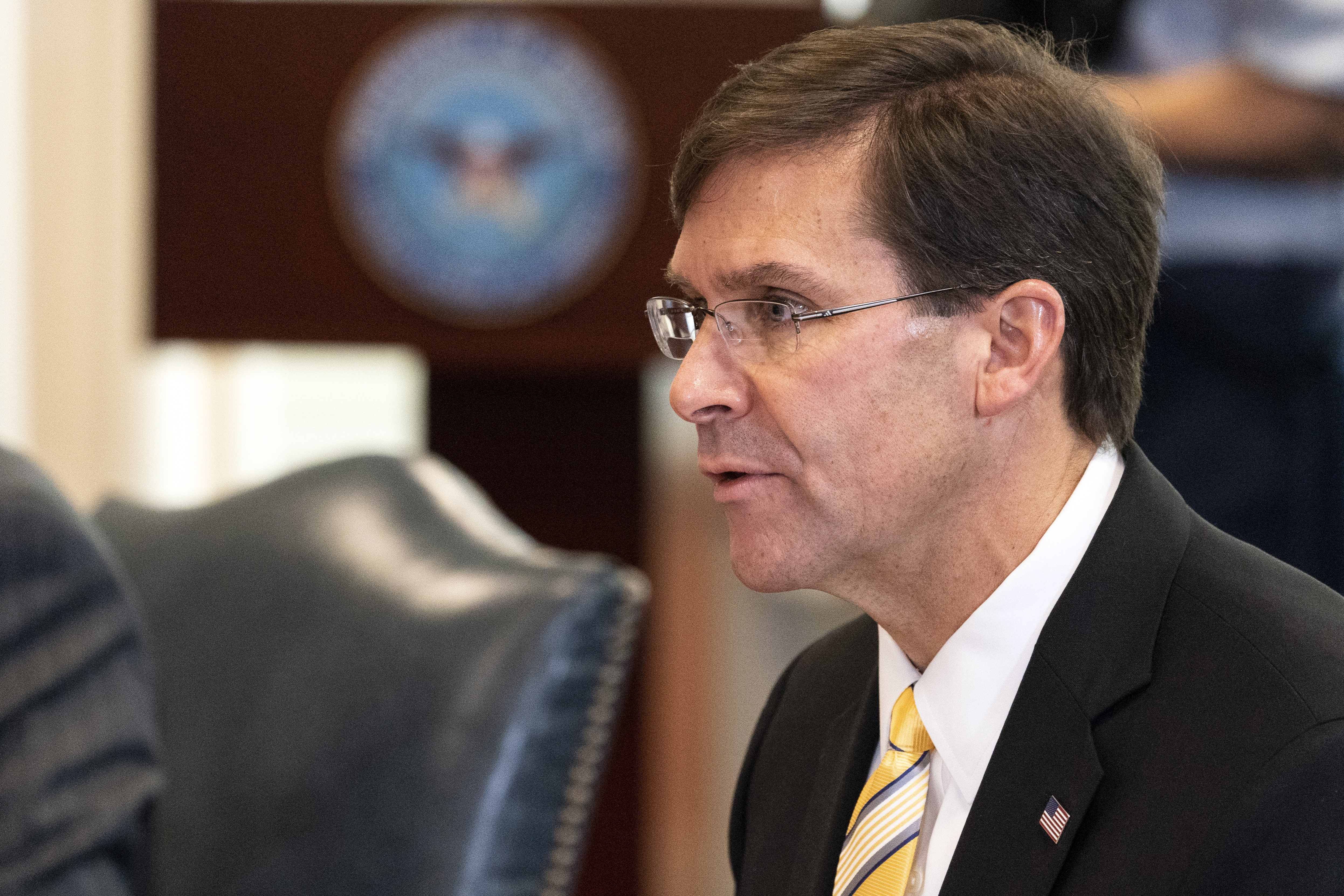 FILE - Secretary of Defense Mark Esper speaks before a meeting with Romanian Defense Minister Nicolae Ciuca, Oct. 8, 2020, at the Pentagon, in Washington. Esper said Wednesday, July 17, 2024, that it was time for the Biden administration "to do better than just playing defense" to Iranian threats on Trump administration officials.(AP Photo/Alex Brandon, File)