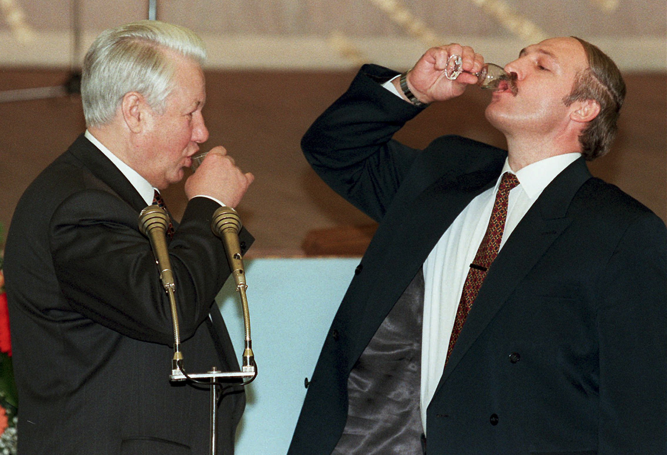 FILE -- Russian President Boris Yeltsin, left, and President Alexander Lukashenko of Belarus drink a toast celebrating the signing of an agreement in the Kremlin in Moscow, Russia, on April 2, 1996. After his first election in 1994, Lukashenko quickly bolstered ties with Russia and pushed for forming a new union state in the apparent hope of becoming its head after a full merger — an ambition dashed by the 2000 election of Vladimir Putin to succeed the ailing Yeltsin. (Pool Photo via AP, File)