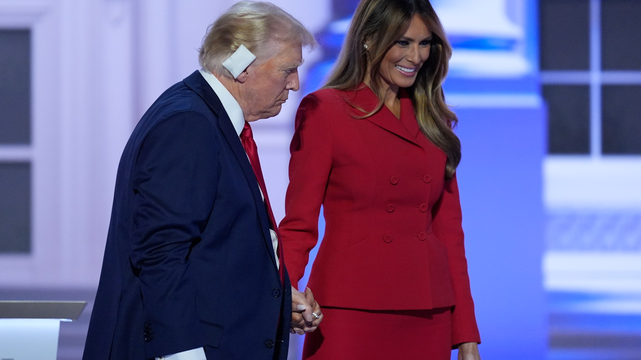 Republican presidential candidate former President Donald Trump is joined on stage by former first lady Melania Trump at the Republican National Convention Thursday, July 18, 2024, in Milwaukee. (AP Photo/J. Scott Applewhite)