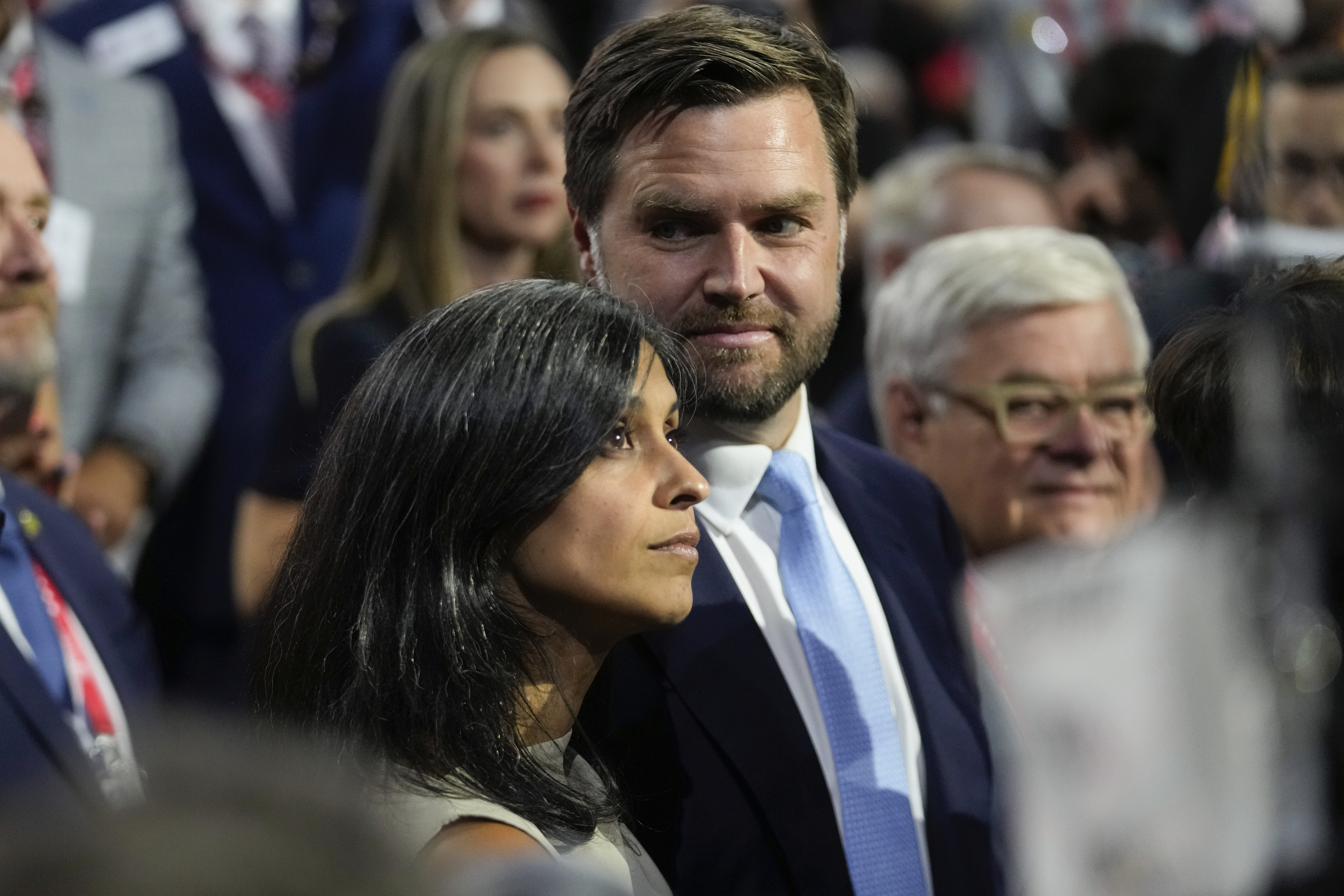 Republican vice presidential candidate Sen. JD Vance arrives with his wife Usha Chilukuri Vance at the Republican National Convention Monday, July 15, 2024, in Milwaukee. (AP Photo/Paul Sancya)