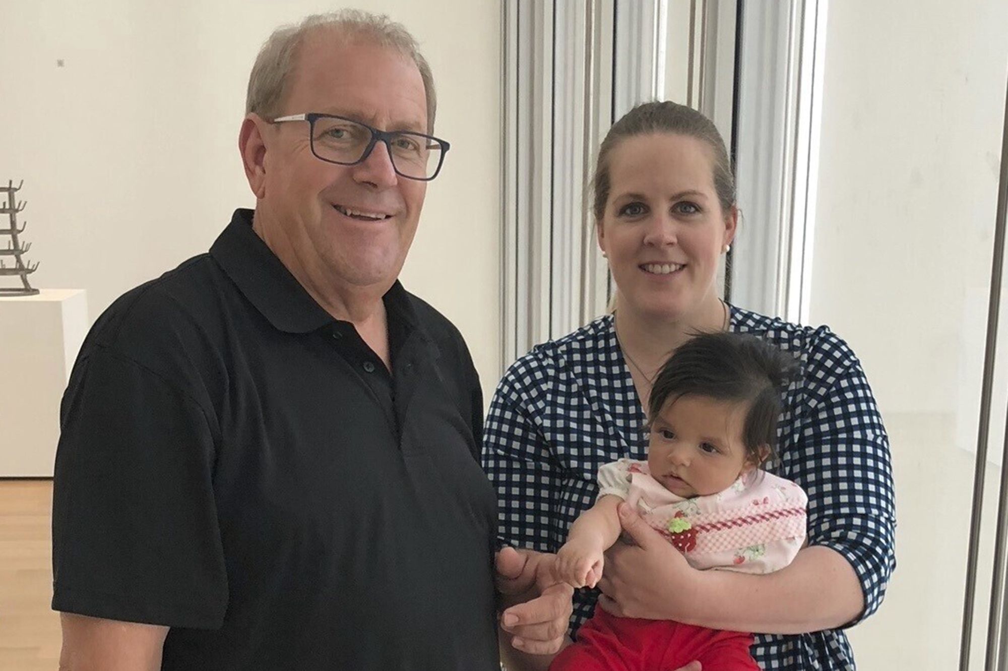 This photo provided by the family in 2024 shows Gary Baulos, left, with his daughter, Alison, and her daughter, Athena, at the Art Institute of Chicago. Alison Baulos says her 73-year-old father was about to head to a Kentucky hospital for open-heart surgery when it was abruptly canceled Friday morning, July 19, 2024. His was one of the many operations and medical treatments halted across the country Friday because of a global technology outage. (Courtesy Alison Baulos via AP)