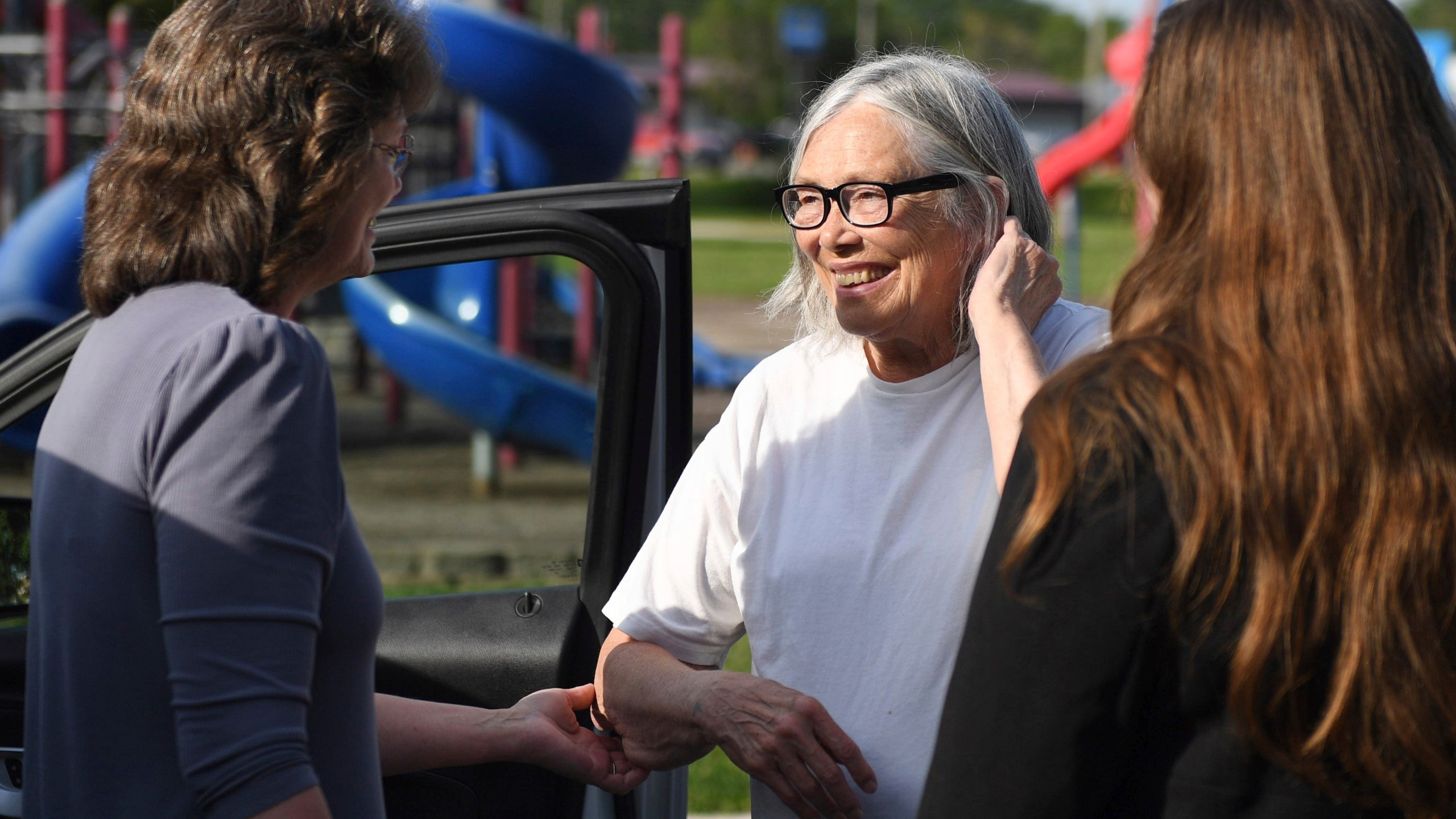 Sandra Hemme, center, meets with family and supporters after she was released from Chillicothe Correctional Center, Friday, July 19, 2024, in Chillicothe, Miss. Hemme's murder conviction was overturned after she served 43 years in prison, despite objections from Missouri’s attorney general. (HG Biggs/The Kansas City Star via AP)