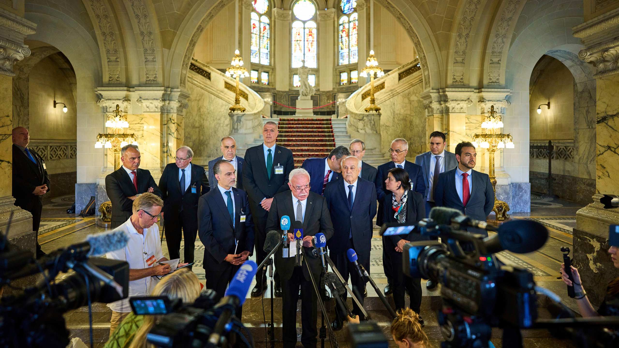 Palestinian foreign policy advisor Riad Malki speaks to media at the International Court of Justice, or World Court, in The Hague, Netherlands, Friday, July 19, 2024. The top U.N. court said Friday that Israel’s presence in the Palestinian occupied territories is “unlawful” and called on it to end and for settlement construction to stop immediately, issuing an unprecedented, sweeping condemnation of Israel’s rule over the lands it captured 57 years ago. (AP Photo/Phil Nijhuis)