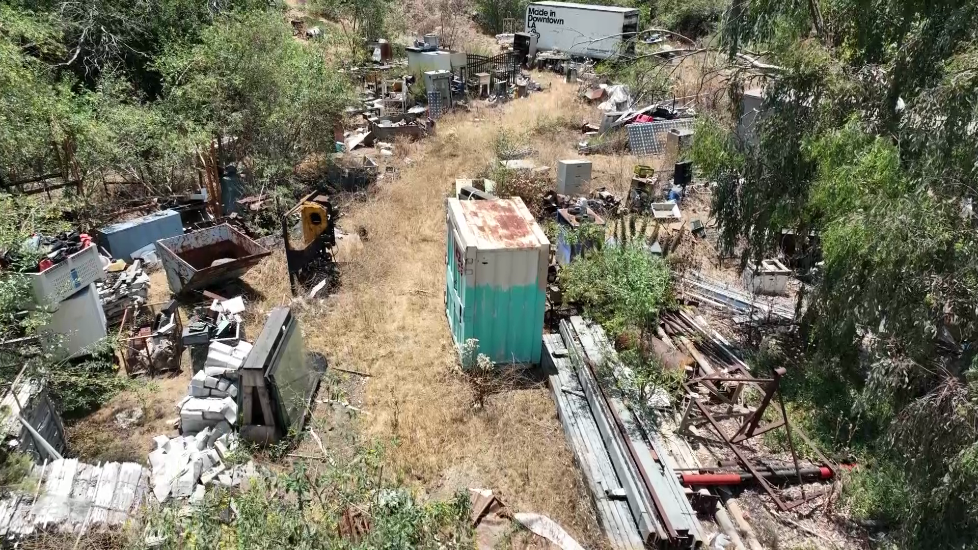 A family in Sun Valley is feeling trapped by a neighbor's sprawling and constantly growing junk collection as seen on July 8, 2024. (KTLA)