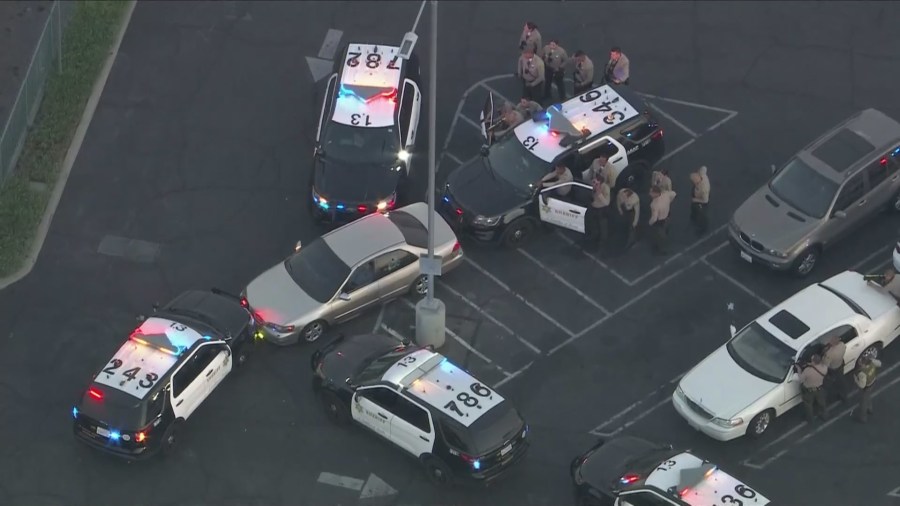 Two suspects were arrested after standing off with deputies in a Compton parking lot following a multi-city pursuit on July 5, 2024. (KTLA)