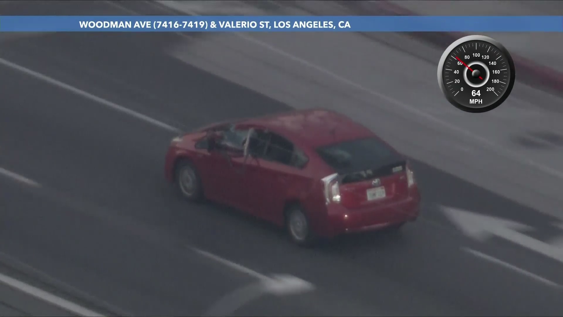 Major windshield and front-end damage is seen after a driver in a suspected stolen vehicle rammed a metal gate during a pursuit in the San Fernando Valley on July 4, 2024. (KTLA)