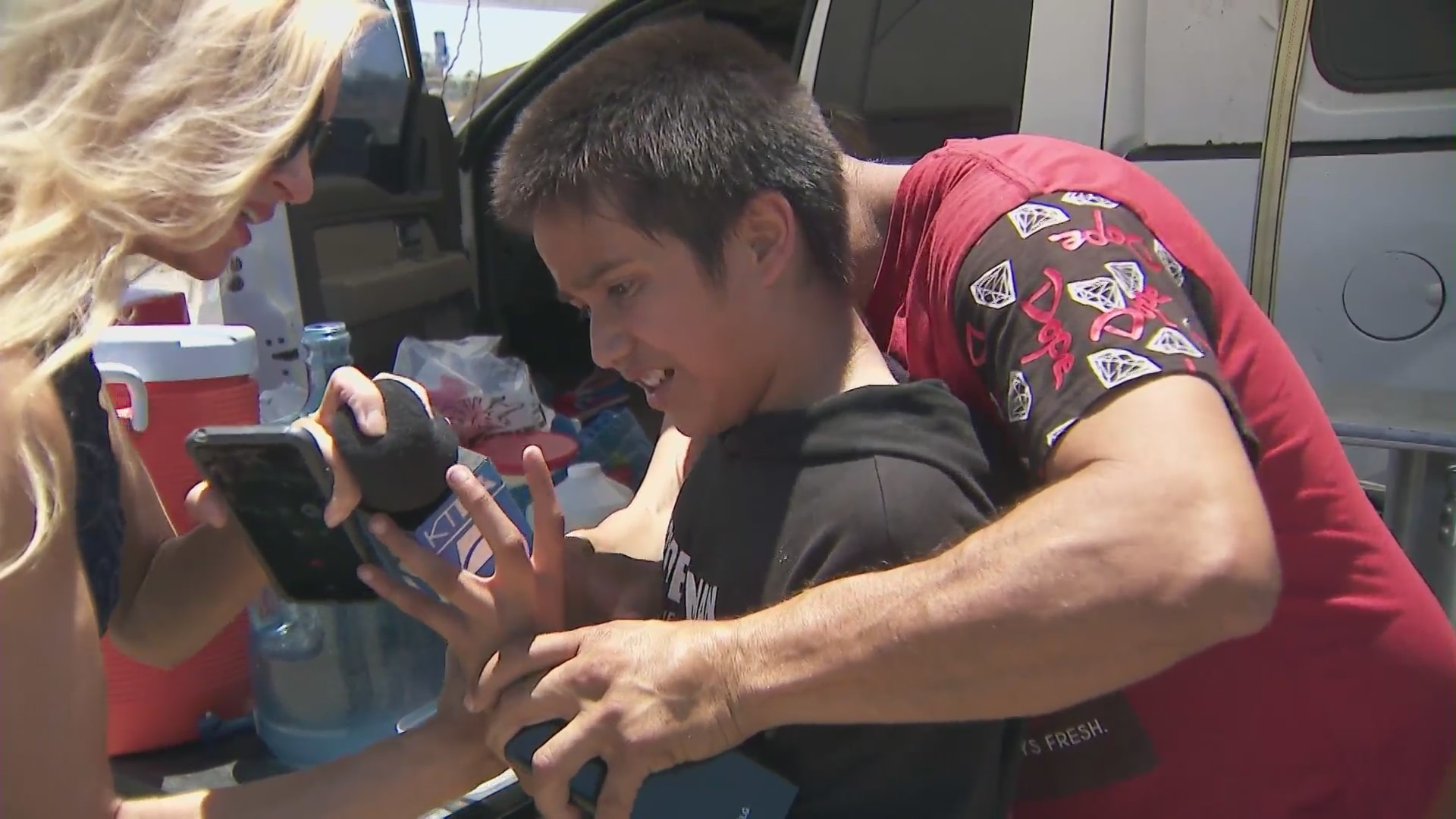 A man seen walking up to Alfredo Morales, 10, and slapping him in the face after the boy touched the emblem on his Mercedes-Benz sedan in Pacoima on July 1, 2024.