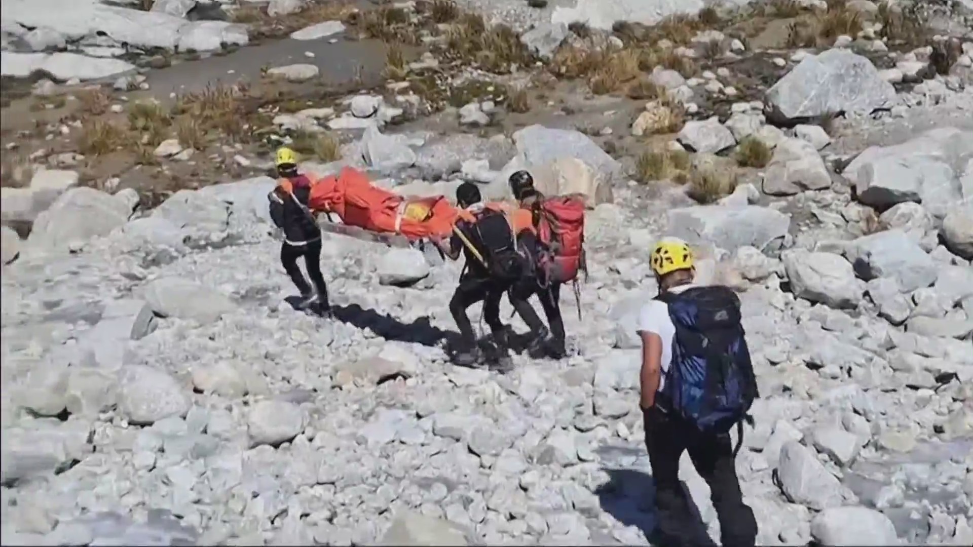 Team members carried Bill Stampfl's body down Mount Huascarán in Peru. (Ryan Cooper)