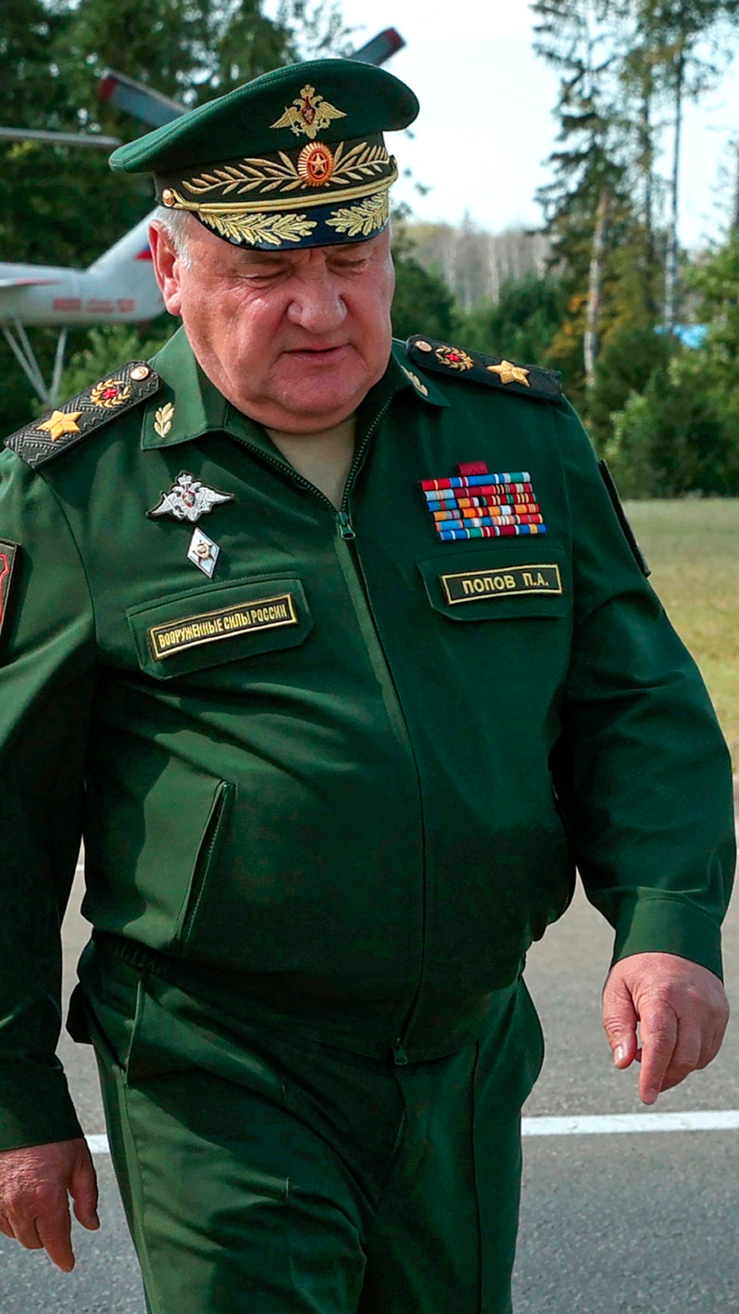 Former Russian Deputy Defense Minister Pavel Popov walks to attend the Army-2022 International Military-Technical Forum at the Russian Armed Forces' Patriot Park in Kubinka, outside Moscow, Russia, Tuesday, Aug. 16, 2022. Popov was detained on fraud charges Thursday, Russian state news agencies said in the latest high-profile arrest of a senior military official in Russia. (Ekaterina Shtukina, Sputnik Pool Photo via AP)