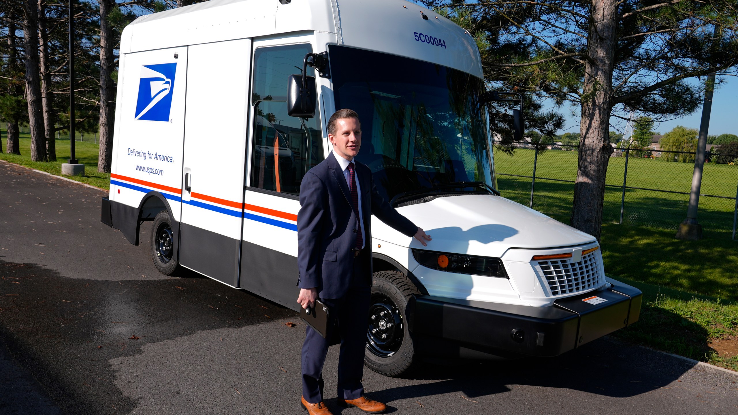 Patrick Ecker, fleet strategy and support executive manager, introduces the U.S. Postal Service's next-generation delivery vehicle at the Kokomo Sorting and Delivery Center in Kokomo, Ind., Thursday, Aug. 29, 2024. (AP Photo/Michael Conroy)