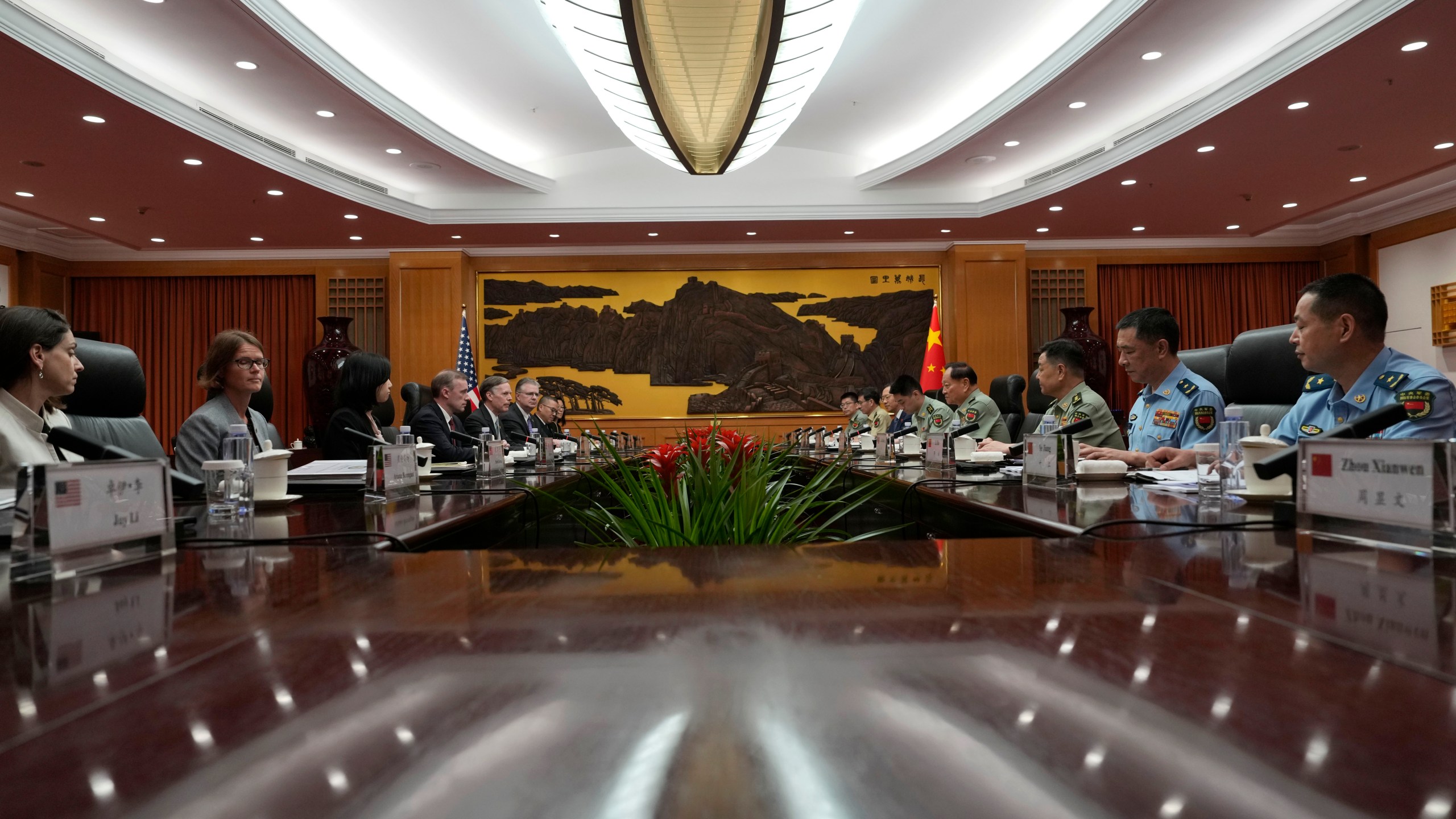 Zhang Youxia, Vice Chairman of the CPC Central Military Commission, fourth from right holds a meeting with White House national security adviser Jake Sullivan, fourth from left. at the Bayi building in Beijing, Thursday, Aug. 29, 2024. (AP Photo/Ng Han Guan, Pool)