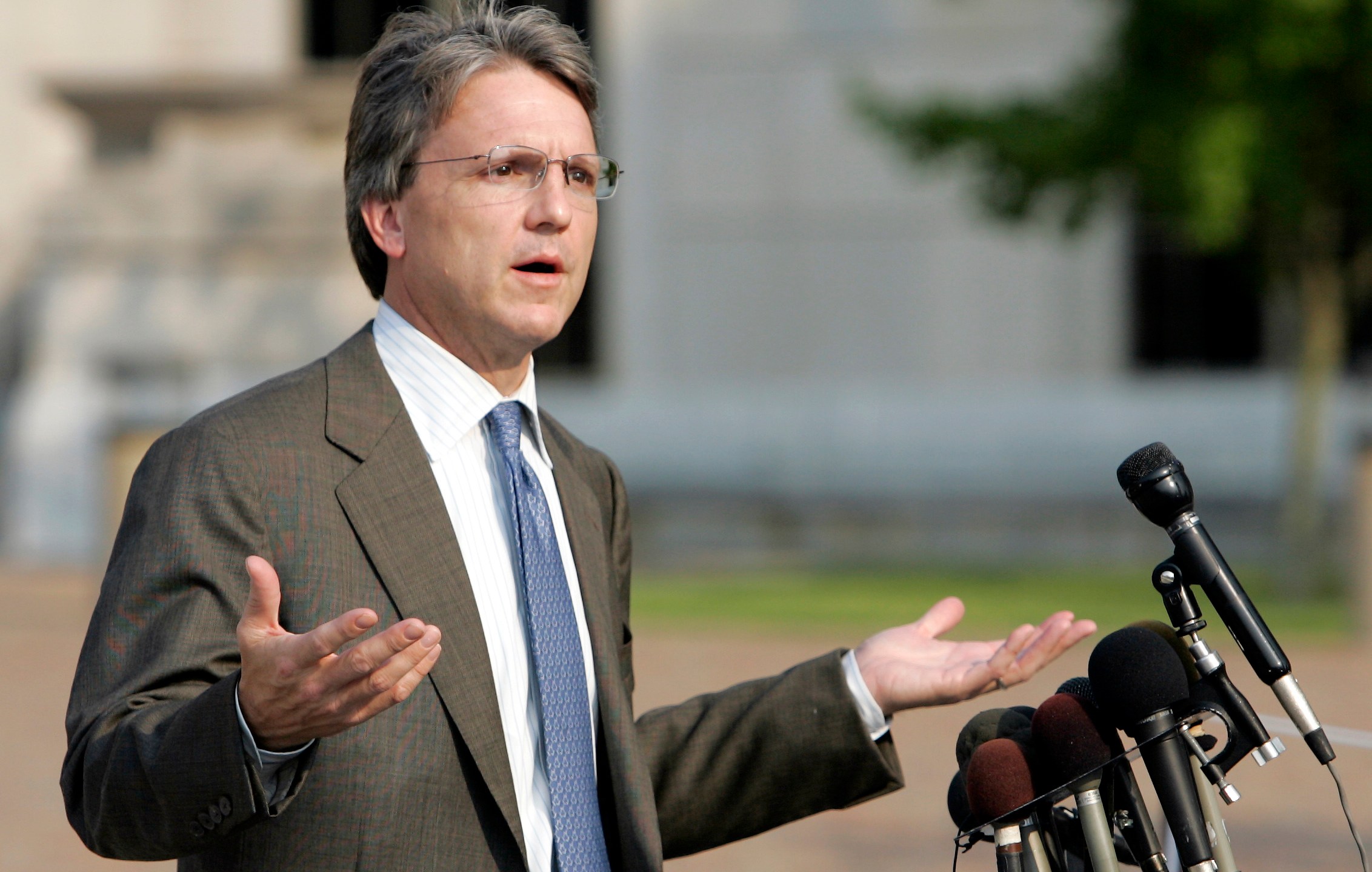 FILE - Paul Hamrick gestures while talking with reporters after the jury in the federal corruption trial against him, as well as former Gov. Don Siegelman, former HealthSouth CEO Richard Scrushy and Mack Roberts reported it was deadlocked on a verdict, June 22, 2006, in Montgomery, Ala. (AP Photo/Rob Carr, File)