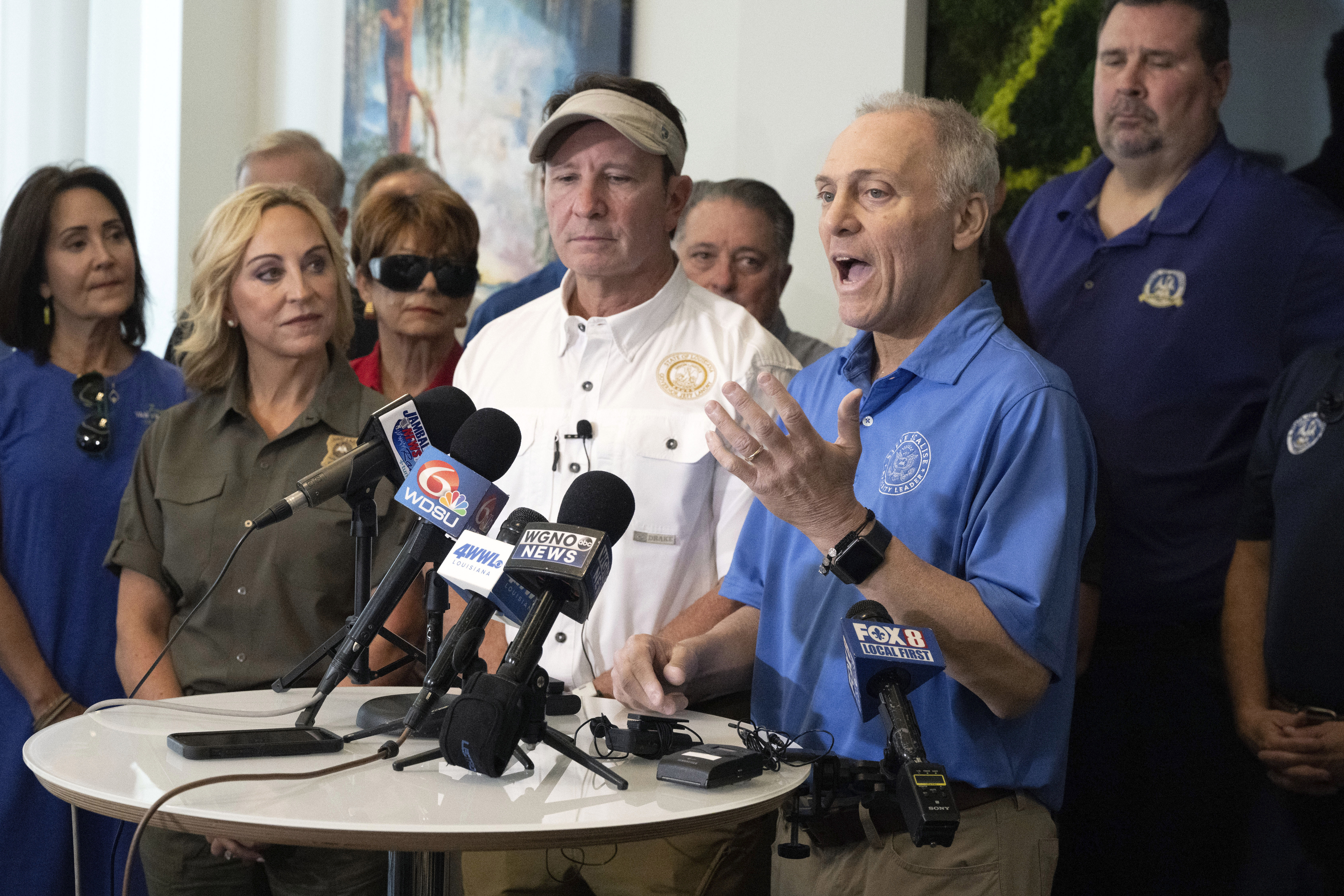 Louisiana Gov. Jeff Landry, center left, stands alongside U.S. Rep. Steve Scalise, center right, as he speaks about the impacts of Hurricane Francine, Friday, Sept. 13, 2024, at New Orleans International Airport in Kenner, La. (Hilary Scheinuk/The Advocate via AP, Pool)