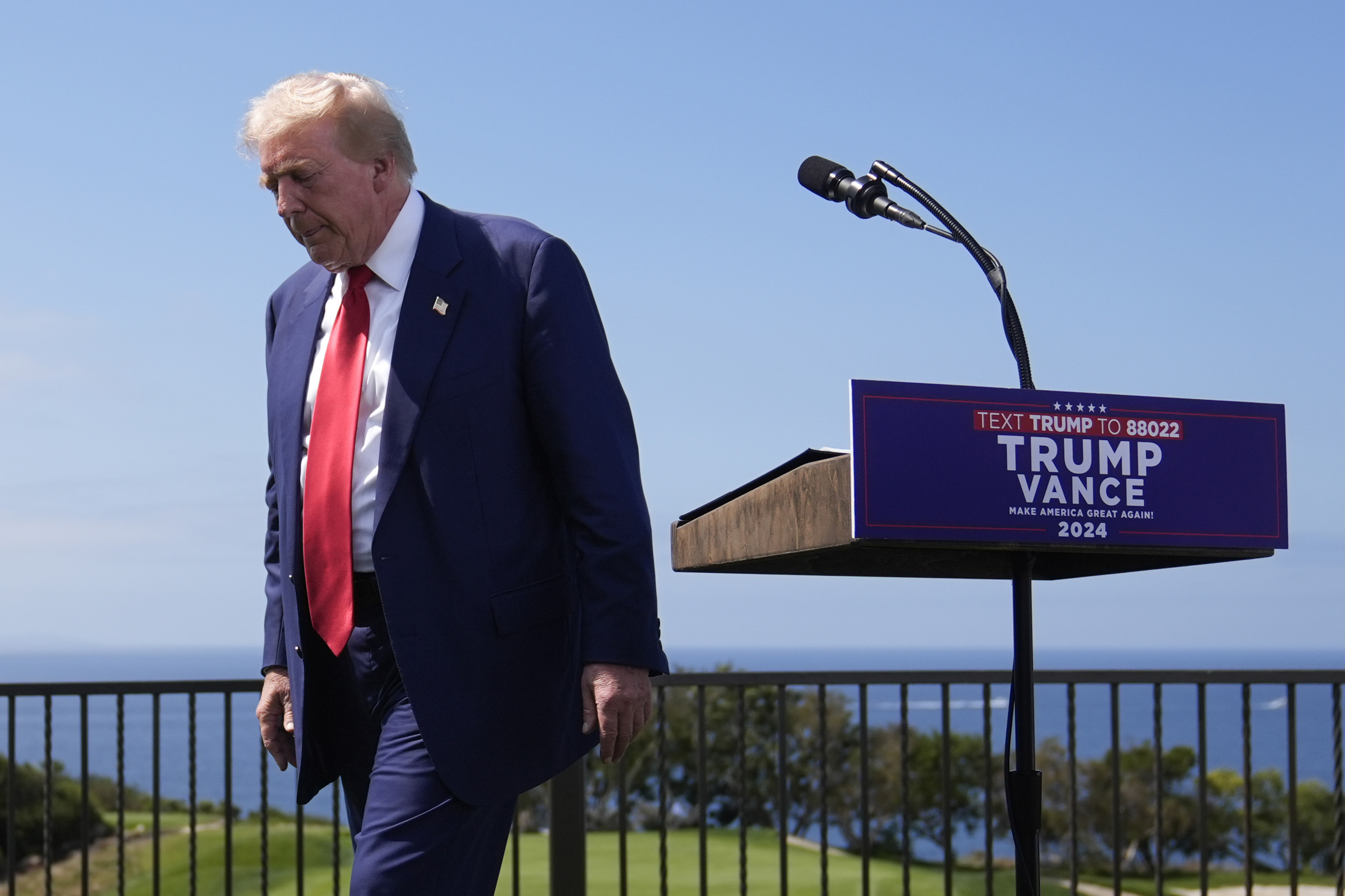 Republican presidential nominee former President Donald Trump leaves the podium after a news conference held at Trump National Golf Club Los Angeles in Rancho Palos Verdes, Calif., Friday, Sept. 13, 2024. (AP Photo/Jae C. Hong)