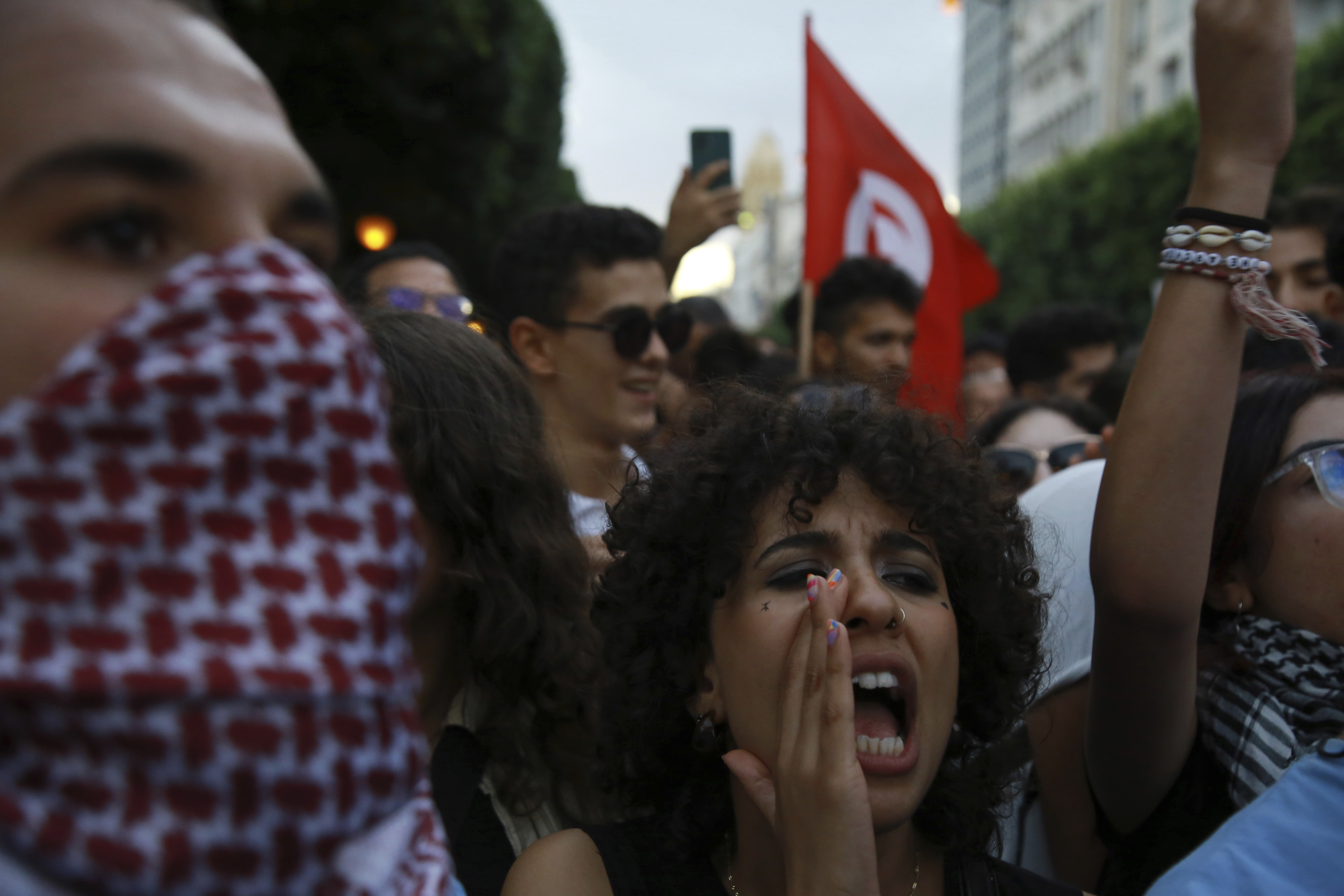 Tunisian take part in a protest against President Kais Saied ahead of the upcoming presidential elections, Friday, Sept. 13, 2024, on Avenue Habib Bourguiba in the capital Tunis. (AP Photo/Anis Mili)