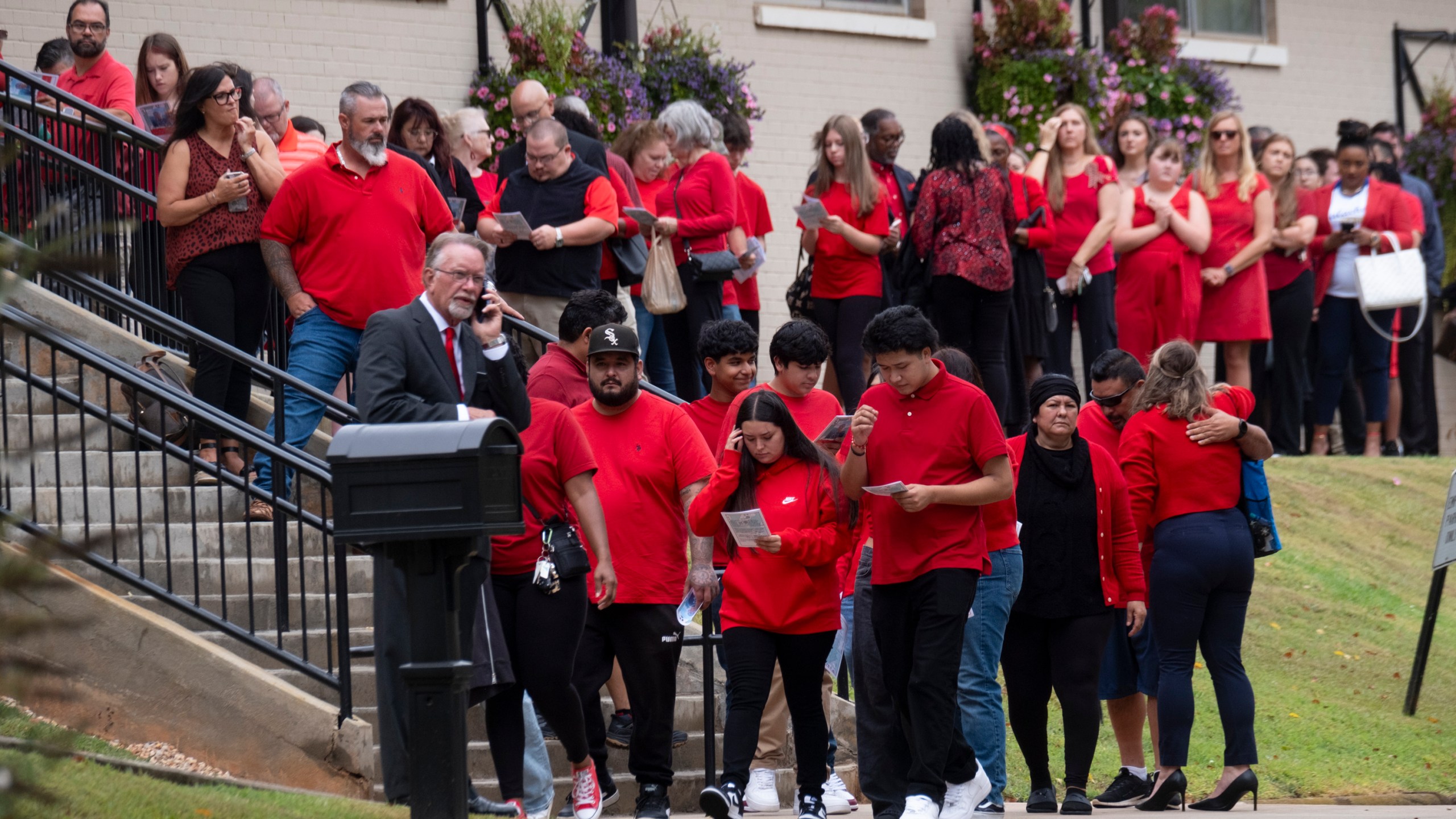 People arrive for the funeral of Apalachee High School shooting victim Mason Schermerhorn in Jefferson, Ga., on Saturday, Sept. 14, 2024. (Ben Gray/Atlanta Journal-Constitution via AP)