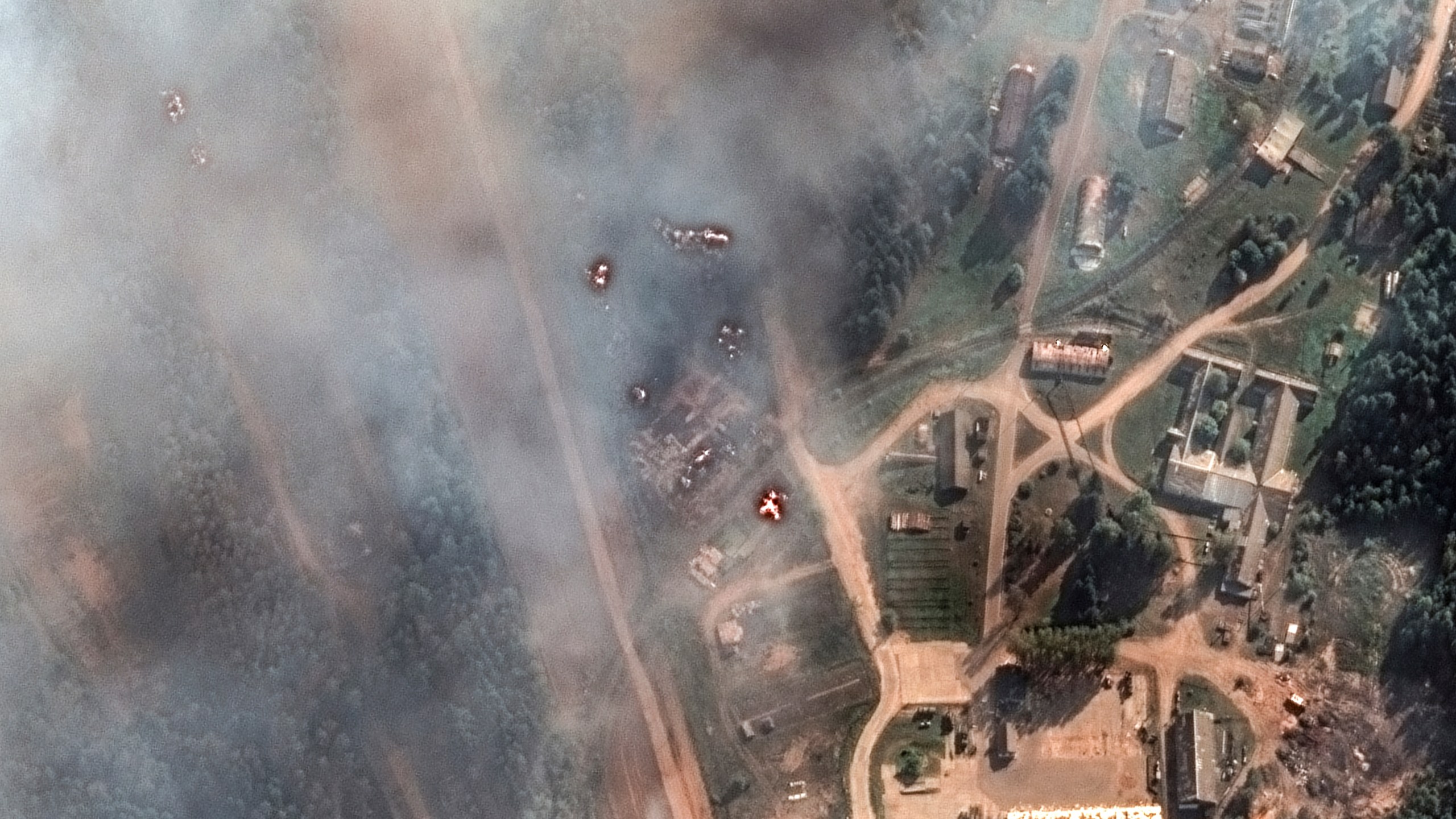 General view of the aftermath of a large series of explosion on an ammunition depot in Toropets, Russia, Wednesday Sept. 18, 2024. (Satellite image ©2023 Maxar Technologies via AP)