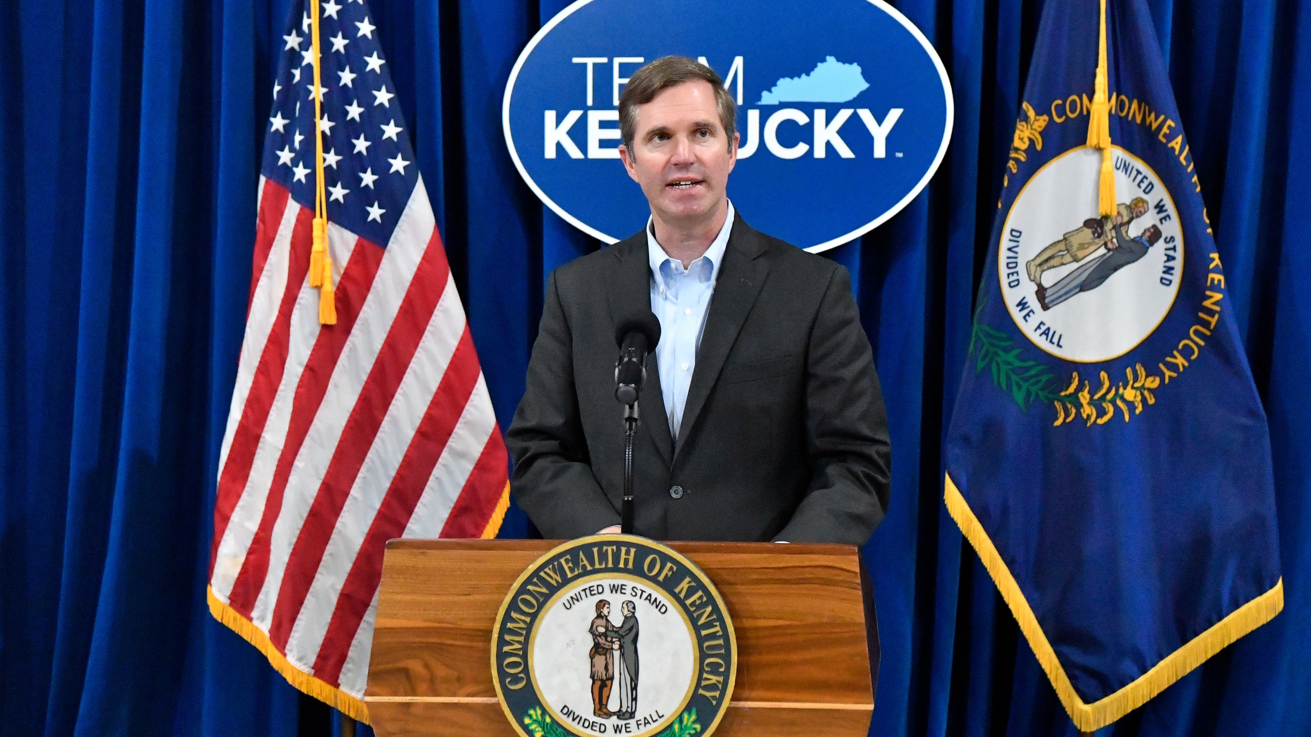 Kentucky Gov. Andy Beshear speaks to a group gathered to celebrate the governor signing an executive order banning the use of “conversion therapy” on minors, Wednesday, Sept. 18, 2024, in Frankfort, Ky. (AP Photo/Timothy D. Easley)