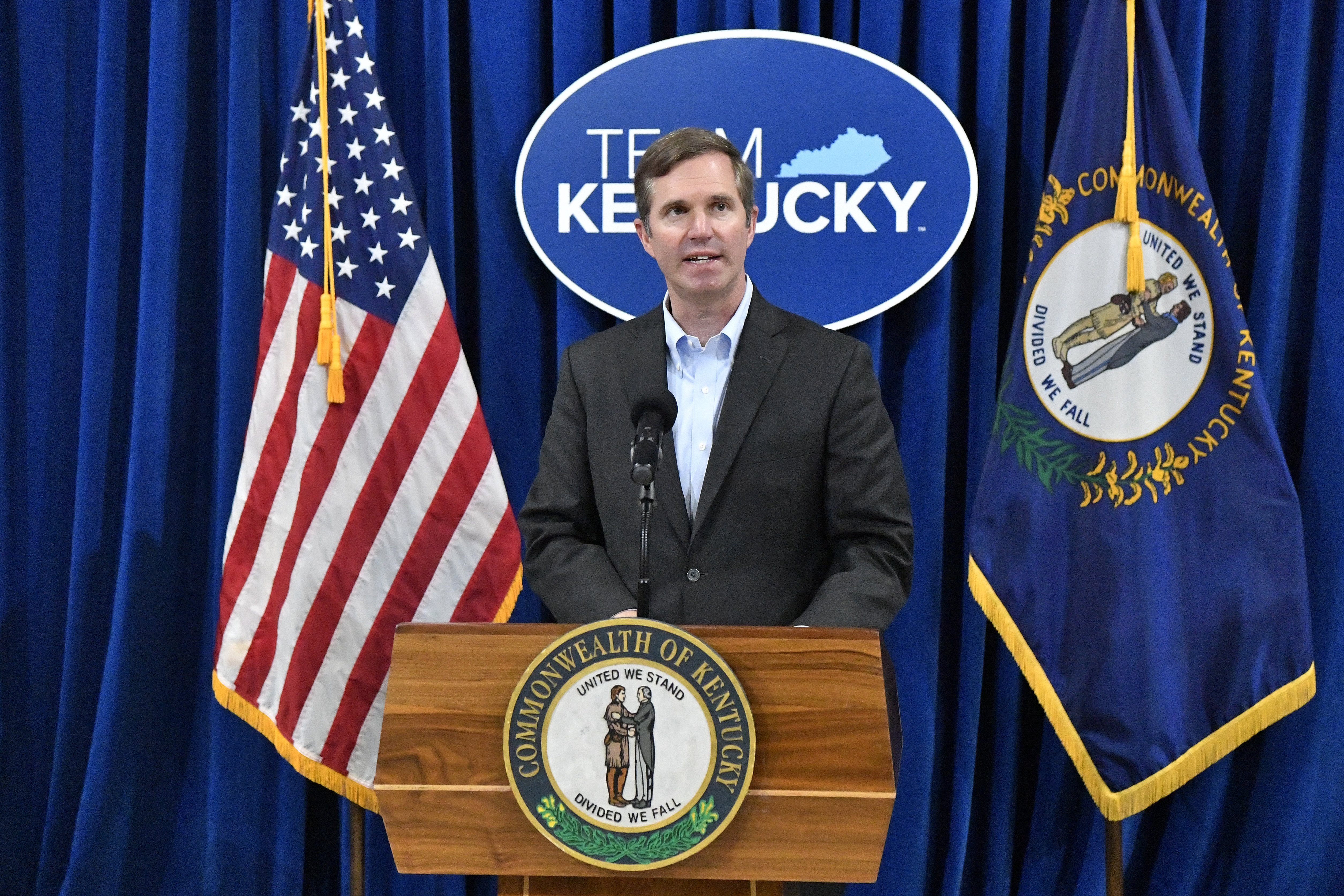 Kentucky Gov. Andy Beshear speaks to a group gathered to celebrate the governor signing an executive order banning the use of “conversion therapy” on minors, Wednesday, Sept. 18, 2024, in Frankfort, Ky. (AP Photo/Timothy D. Easley)