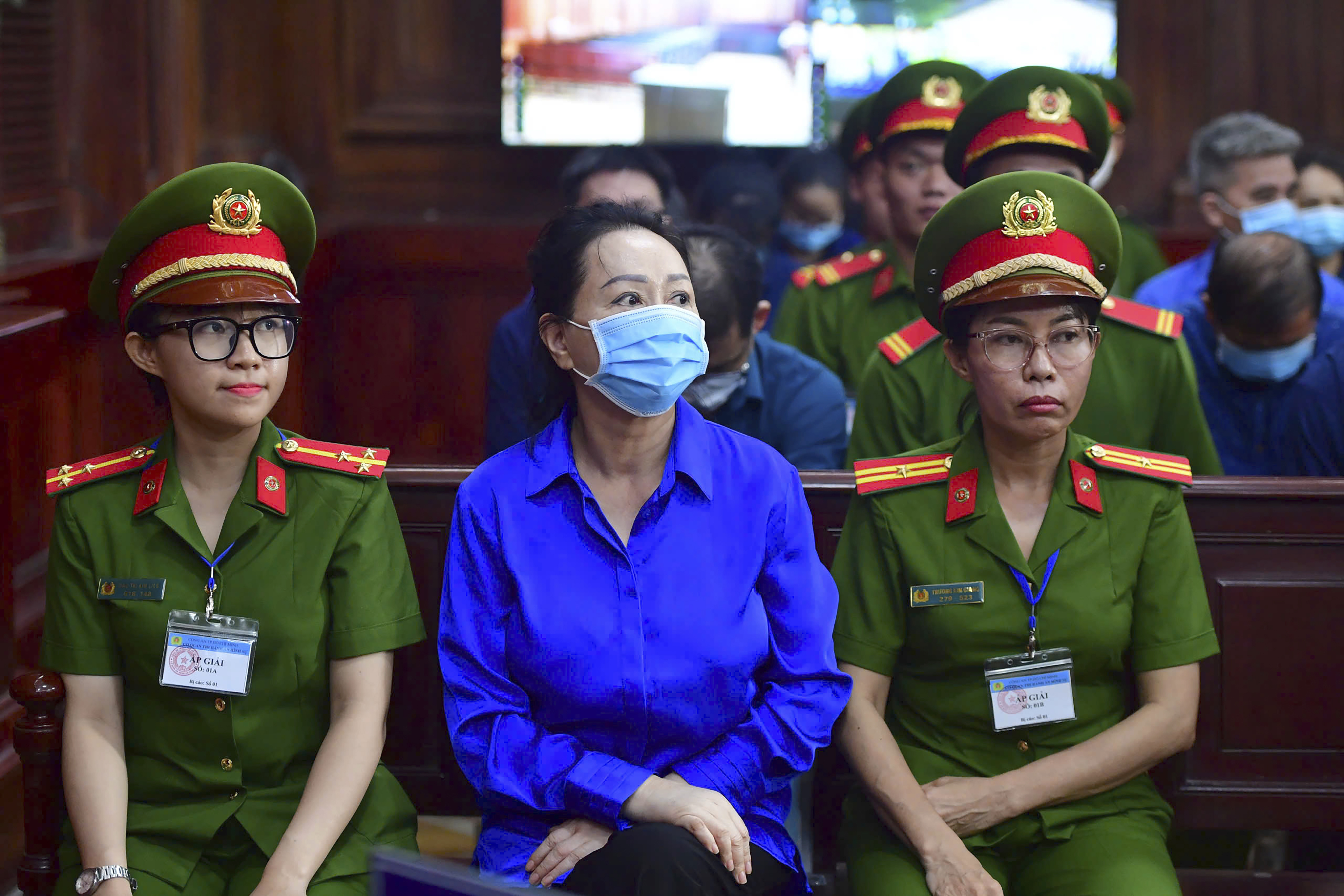 Business woman Truong My Lan, center, a real estate tycoon sentenced to death for financial fraud, attends her second trial in Vietnam's largest fraud case in Ho Chi Minh City, Vietnam Thursday, Sept. 19, 2024. (Thanh Tung/VNExpress via AP)