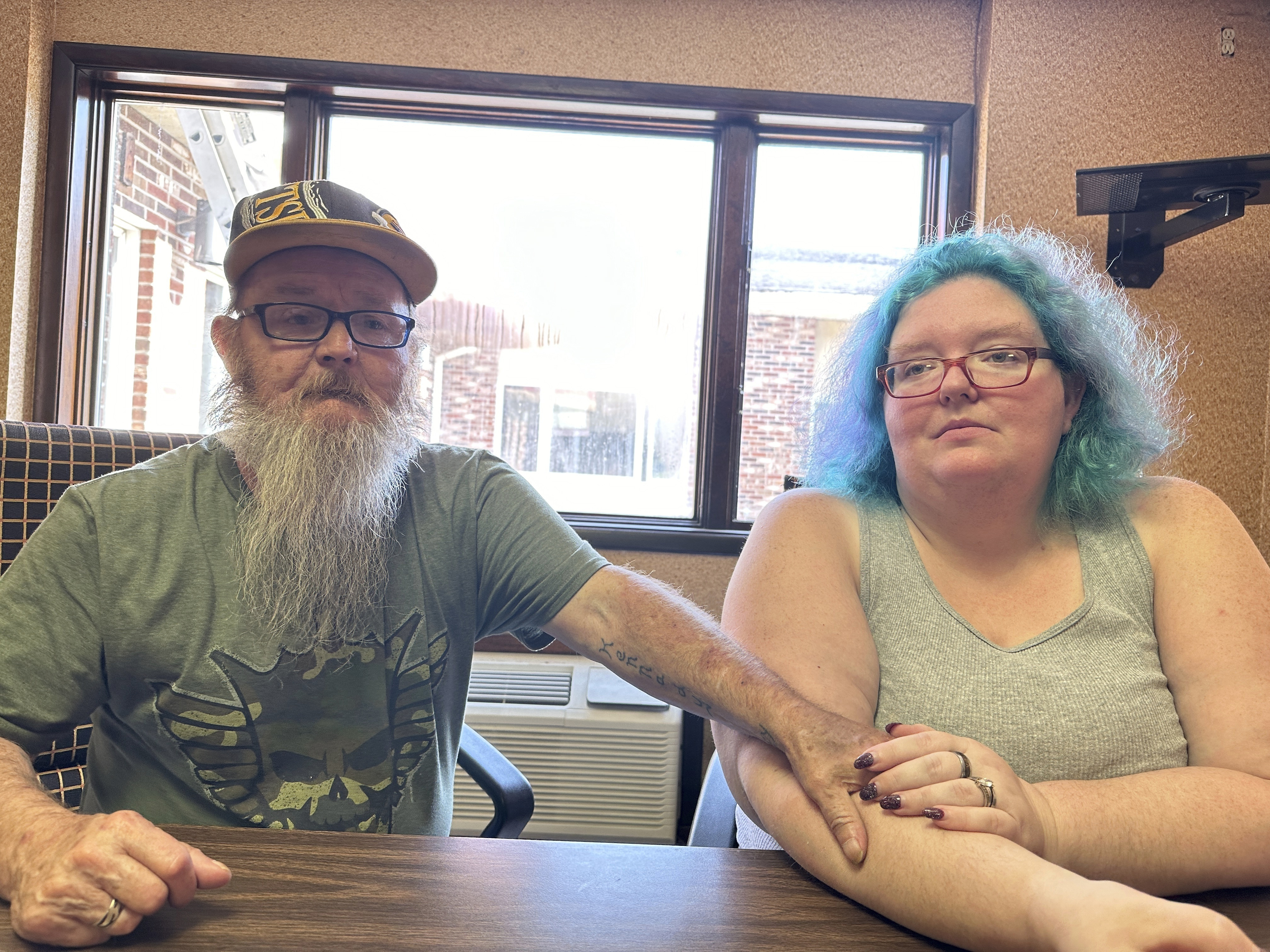 Bruce and Nova Jewett, who are experiencing homelessness, sit at the Hilltop Inn in Berlin, Vt., on Wednesday, Sept. 18, 2024, where they have been living and will have to leave by Oct. 1, 2024. (AP Photo/Lisa Rathke)