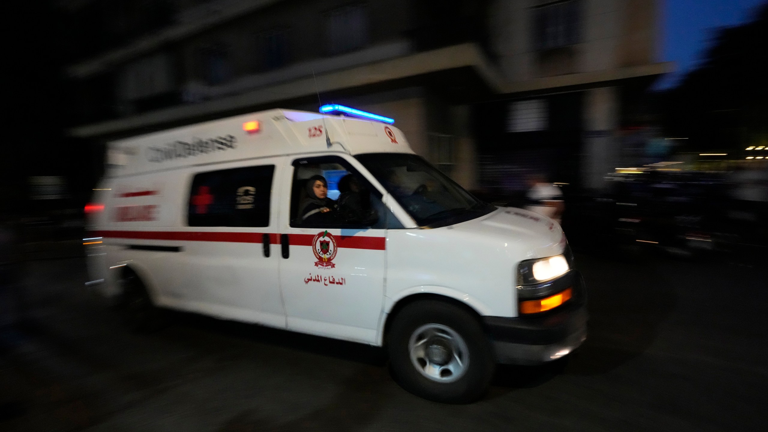 An ambulance carrying wounded people whose handheld pager exploded, arrive at the American University hospital in Beirut, Lebanon, Tuesday, Sept. 17, 2024. (AP Photo/Hassan Ammar)