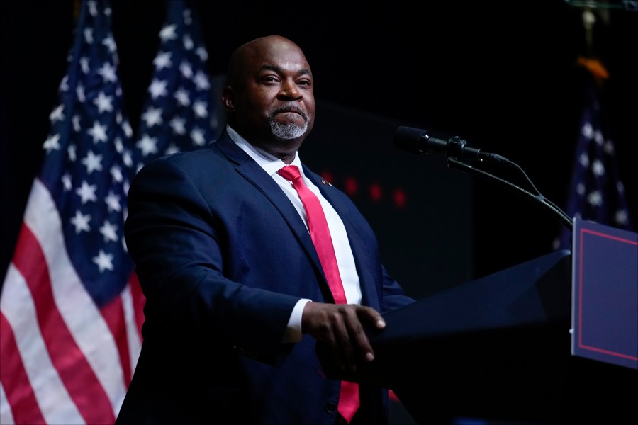 FILE - North Carolina Lt. Gov. Mark Robinson speaks before Republican presidential nominee former President Donald Trump at a campaign rally in Asheville, N.C., Aug. 14, 2024. (AP Photo/Matt Rourke, File)