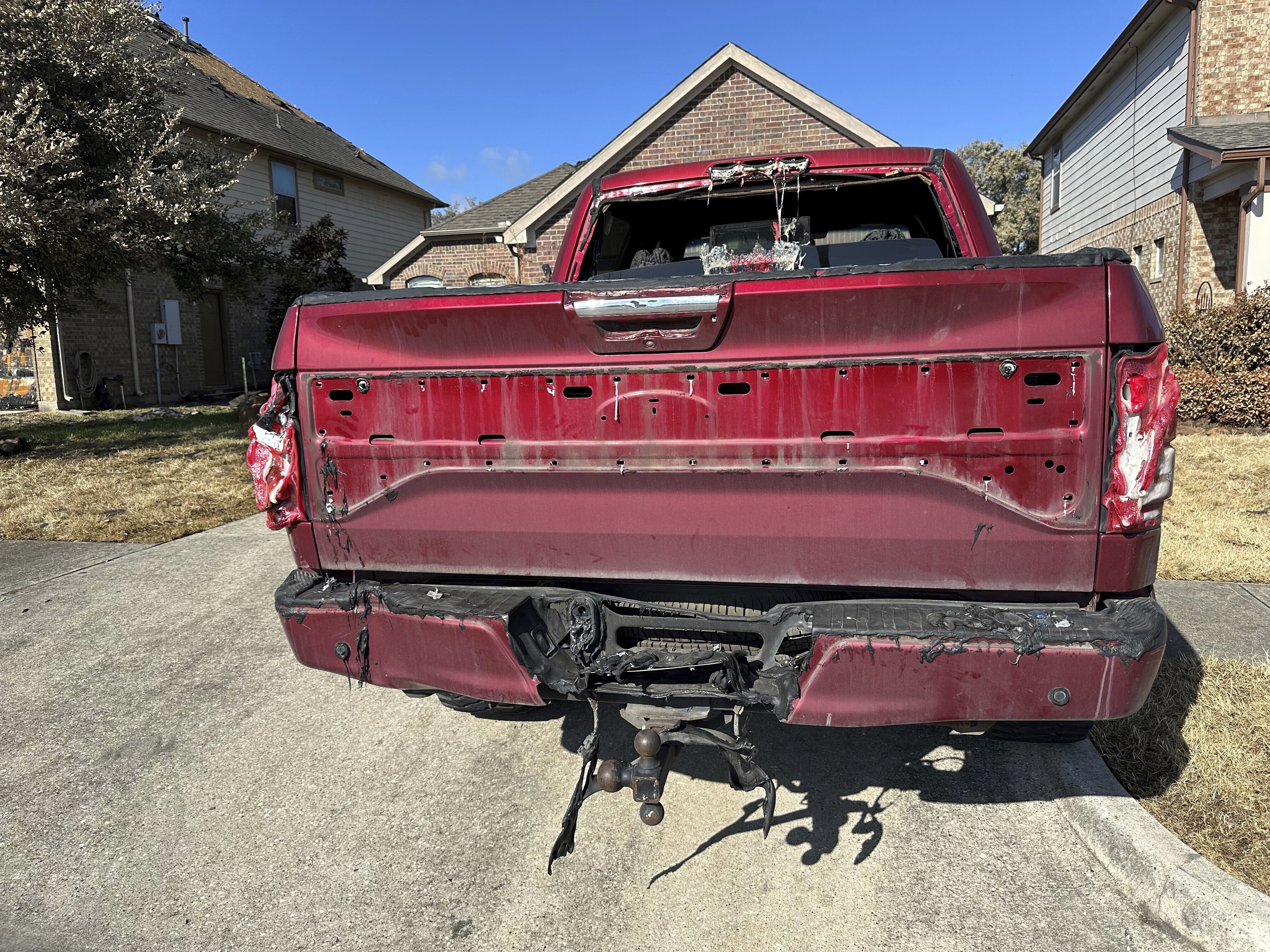 A truck that had parts of its equipment melted by the heat of a pipeline fire sits in the driveway of a home in Deer Park, Texas, on Thursday, Sept. 19, 2024. (AP Photo/Juan A. Lozano)(AP Photo/Juan A. Lozano)