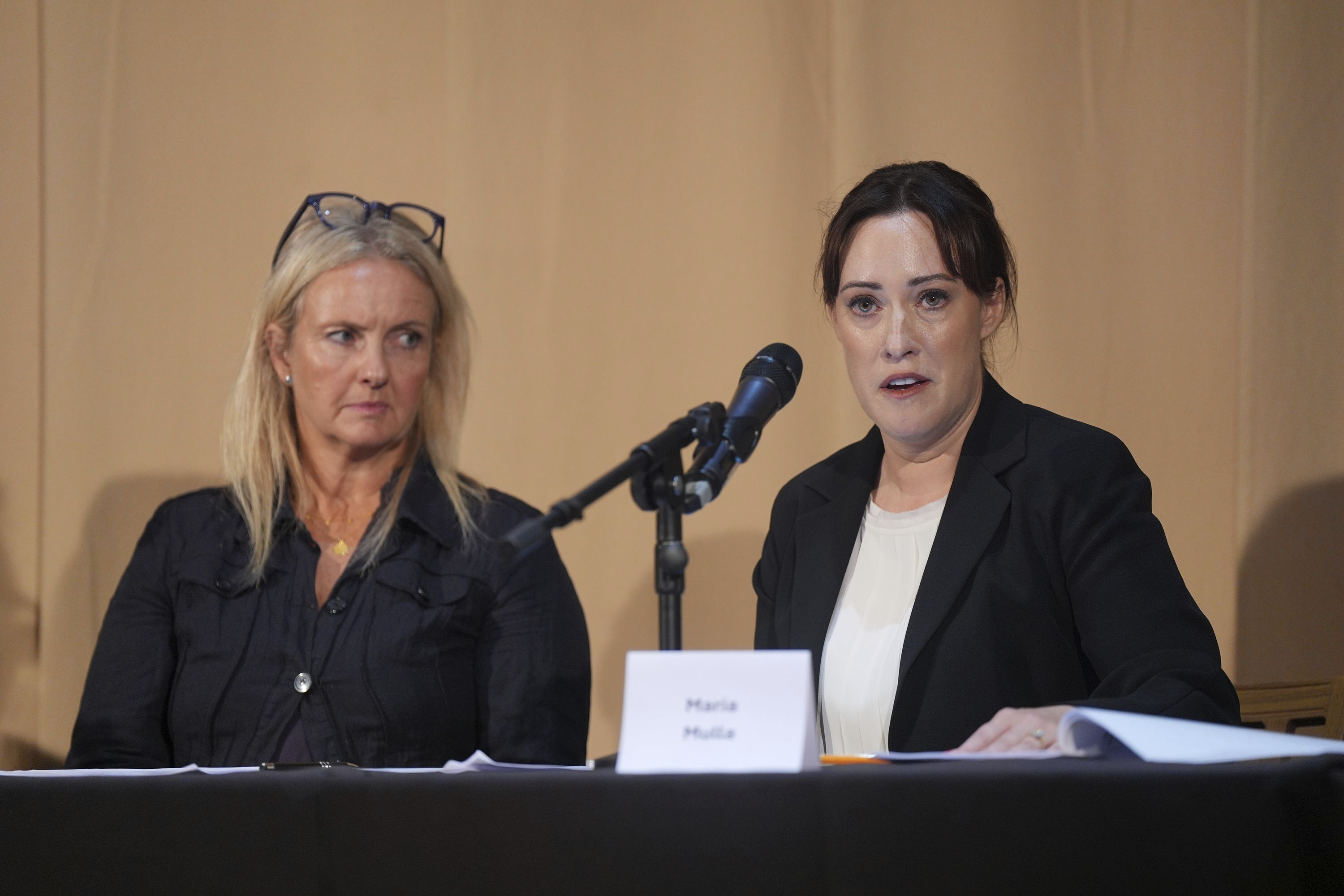 Natacha (no surname given), left, and barrister Maria Mulla, who featured in 'Al-Fayed: Predator at Harrods' hold a press conference to discuss their involvement in the investigation and the legal claim against Harrods for failing to provide a safe system of work for their employees, at Kent House in Knightsbridge, London, Friday Sept. 20, 2024. Multiple ex-Harrods employees have accused Mohamed Al Fayed, the Egyptian billionaire who owned the luxury department store for more than 25 years, of rape and sexual assault. (Yui Mok/PA via AP)