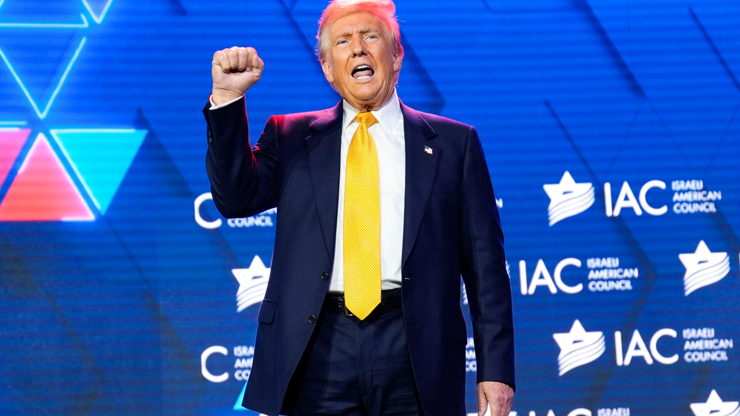 Republican presidential nominee former President Donald Trump acknowledges the crowd after speaking at the Israeli American Council National Summit, Thursday, Sept. 19, 2024, in Washington. (AP Photo/Evan Vucci)