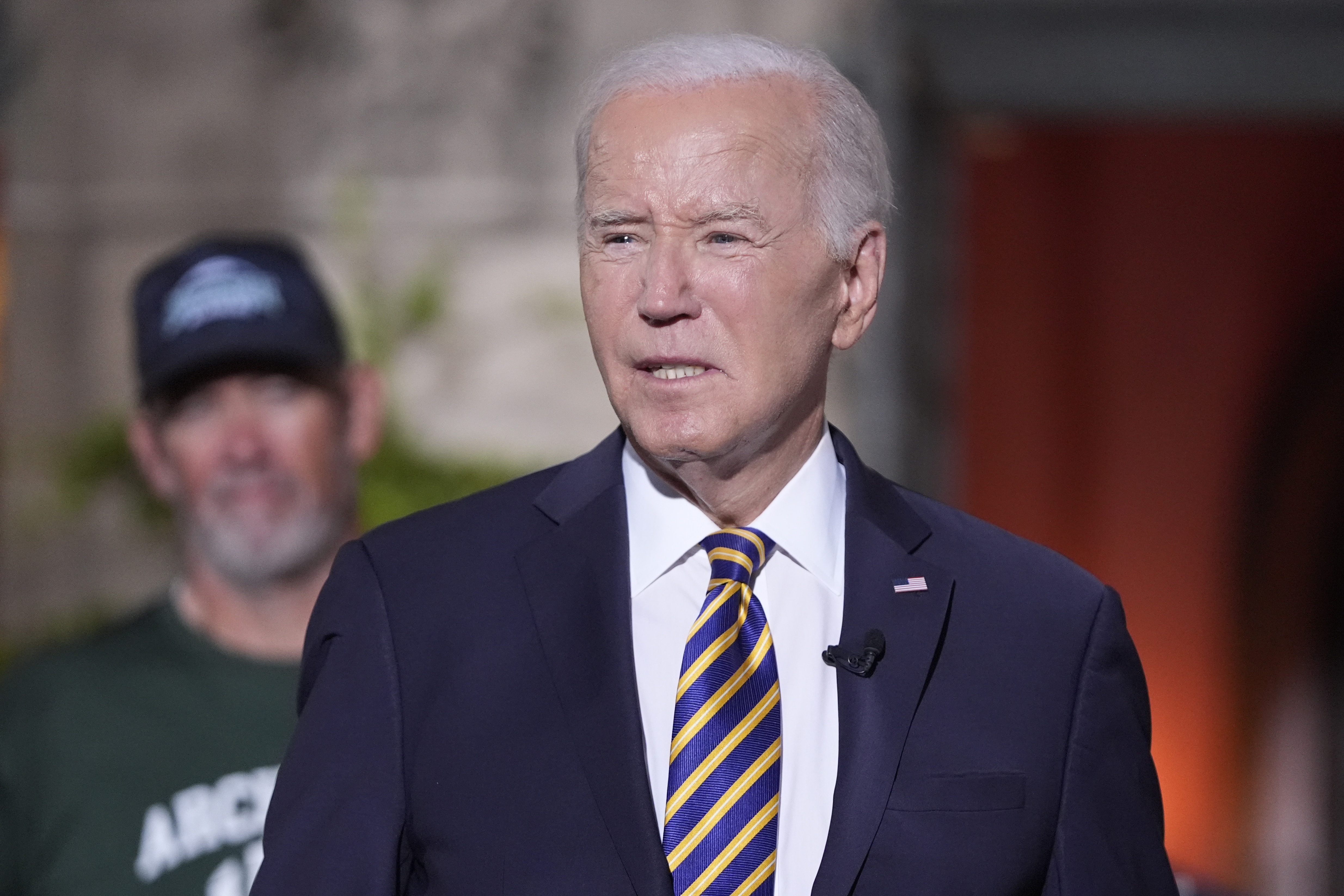 President Joe Biden's speaks with football players at Archmere Academy in Claymont, Del., Friday, Sept. 20, 2024, during a walkthrough visit ahead of his meetings with world leaders there on Saturday. (AP Photo/Mark Schiefelbein)