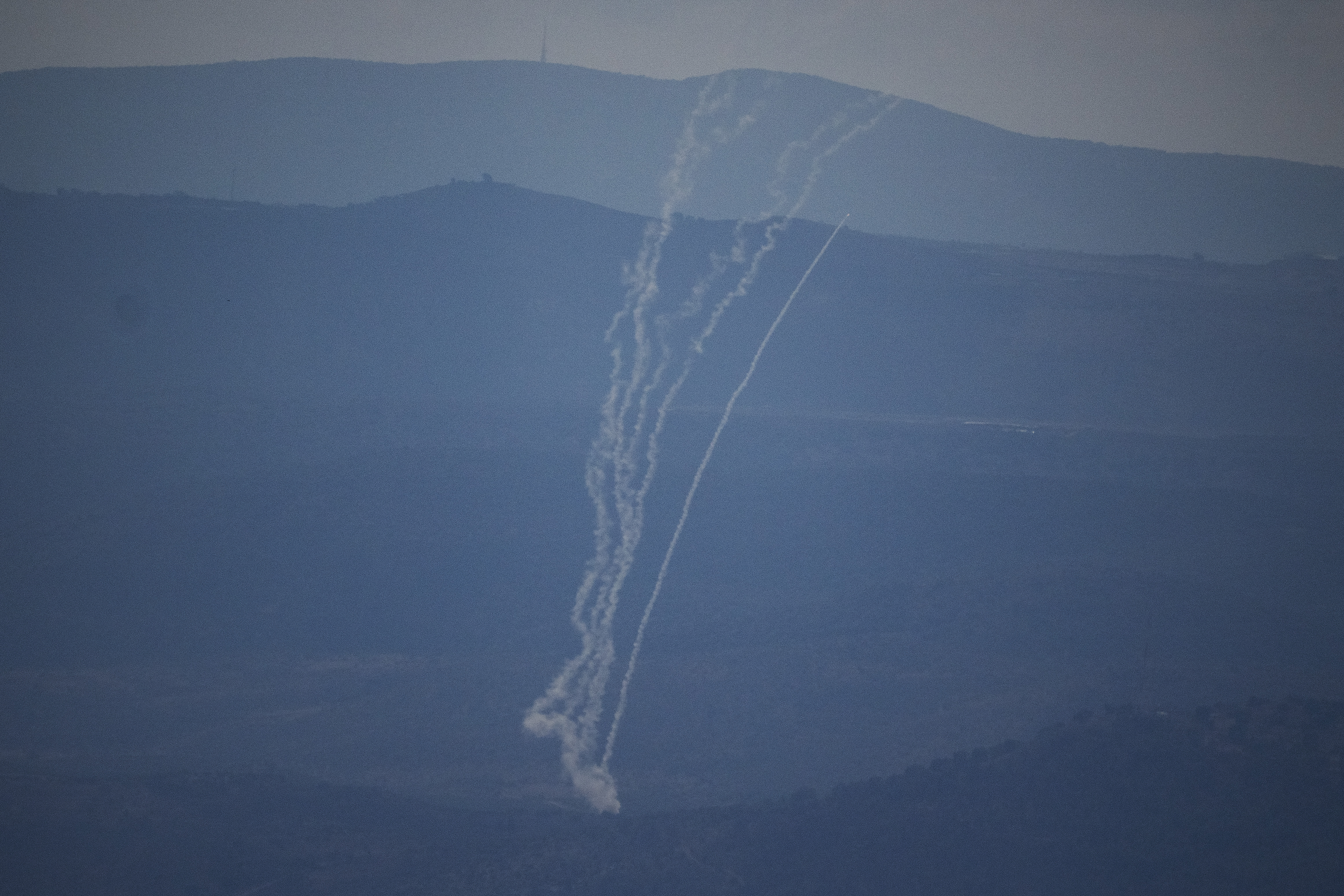 Israeli Iron Dome air defense system fires to intercept rockets that were launched from Lebanon, in northern Israel, Saturday, Sept. 21, 2024. (AP Photo/Leo Correa)