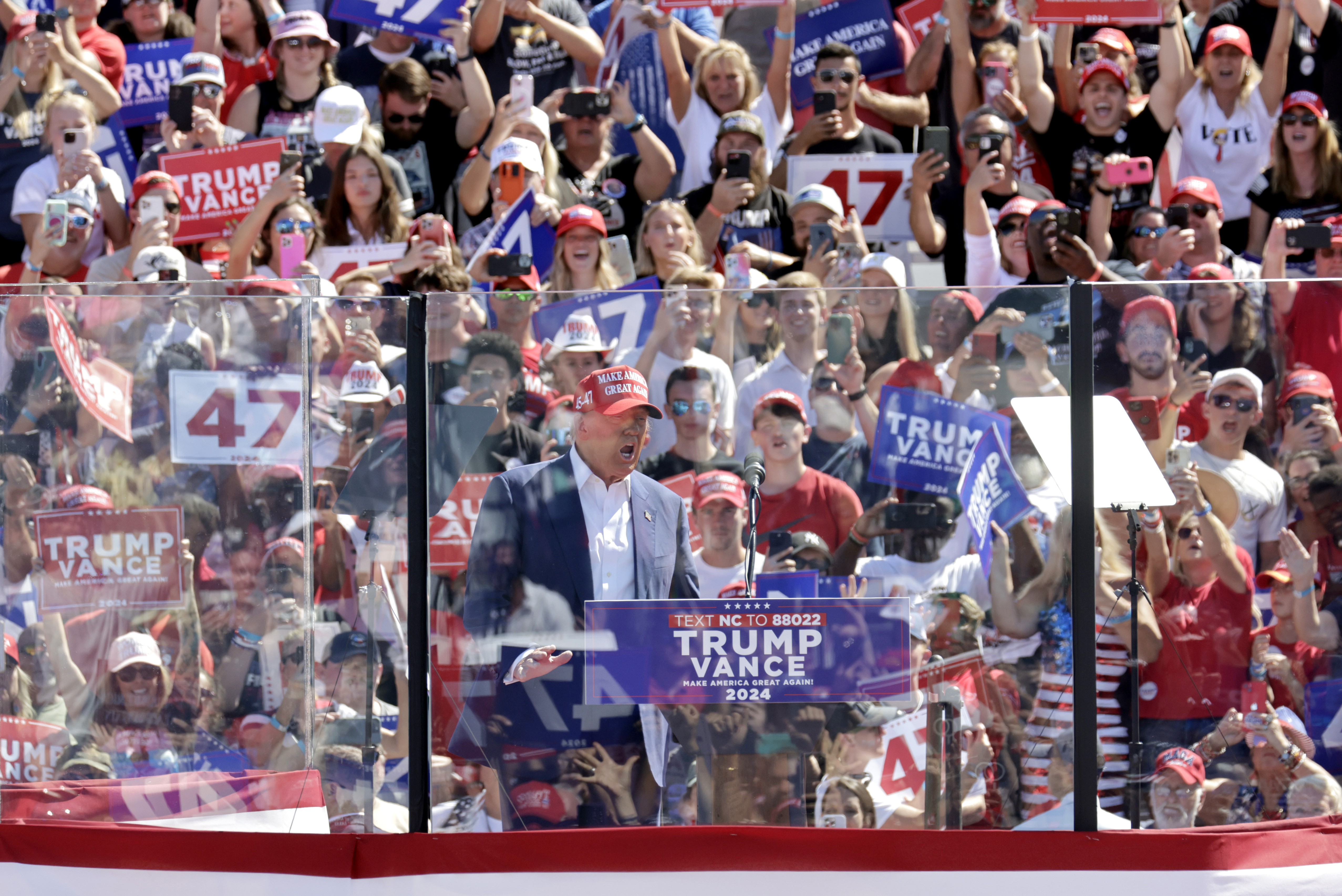 Republican presidential nominee former President Donald Trump speaks at a campaign rally at Wilmington International Airport in Wilmington, N.C., Saturday, Sept. 21, 2024. (AP Photo/Chris Seward)