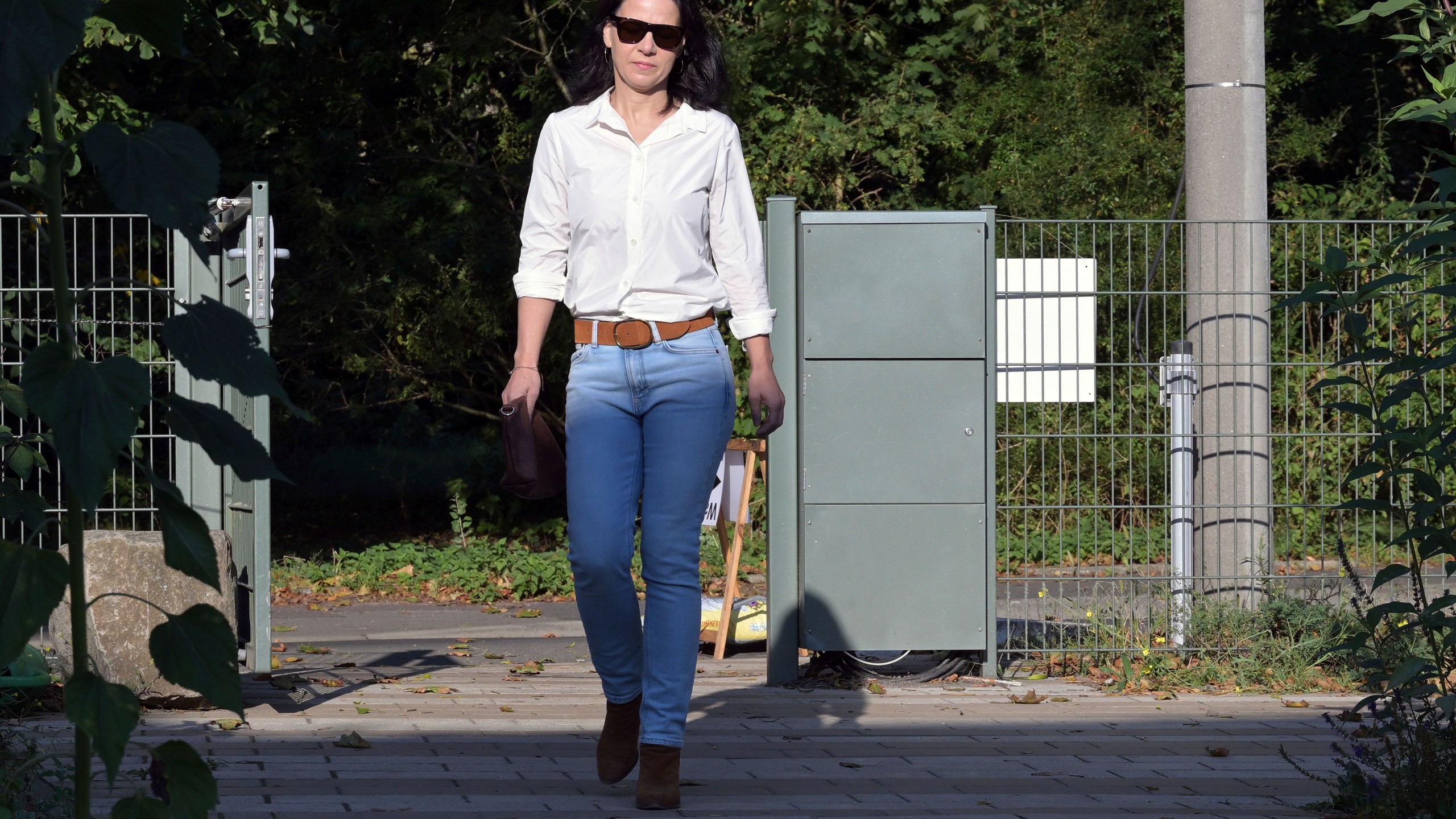 Germany's Foreign Minister Annalena Baerbock arrives to vote in the state election in Brandenburg at a polling station in Potsdam, Germany, Sunday Sept. 22, 2024. (Michael Bahlo/dpa via AP)