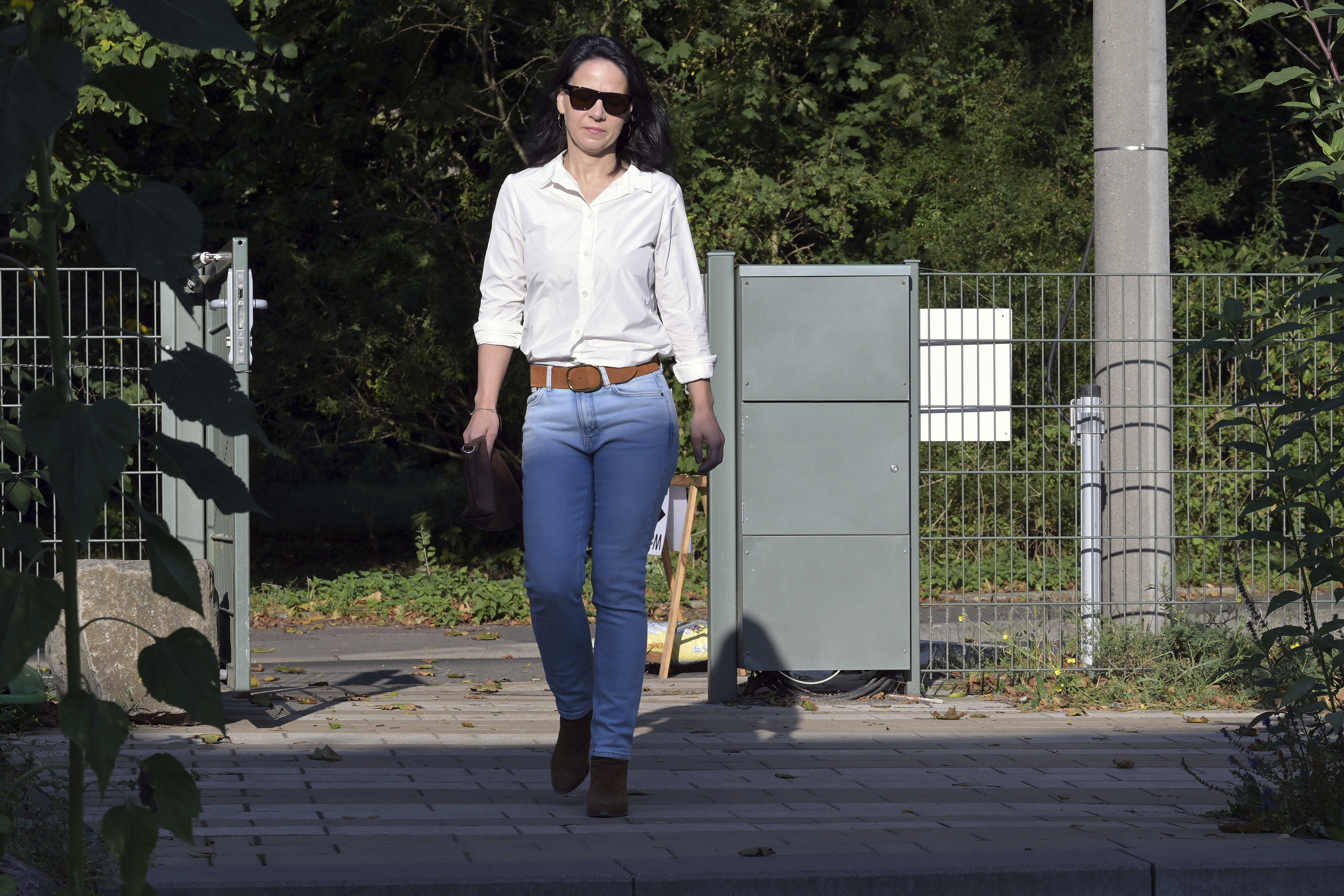 Germany's Foreign Minister Annalena Baerbock arrives to vote in the state election in Brandenburg at a polling station in Potsdam, Germany, Sunday Sept. 22, 2024. (Michael Bahlo/dpa via AP)