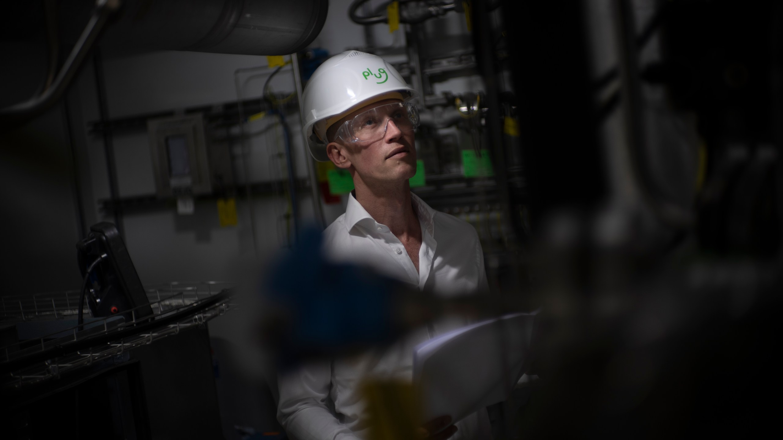 Jordi Zonneveld poses for a portrait at Plug Power where they produce green hydrogen in Alphen aan den Rijn, Netherlands, Friday, June 16, 2023. (AP Photo/Peter Dejong)