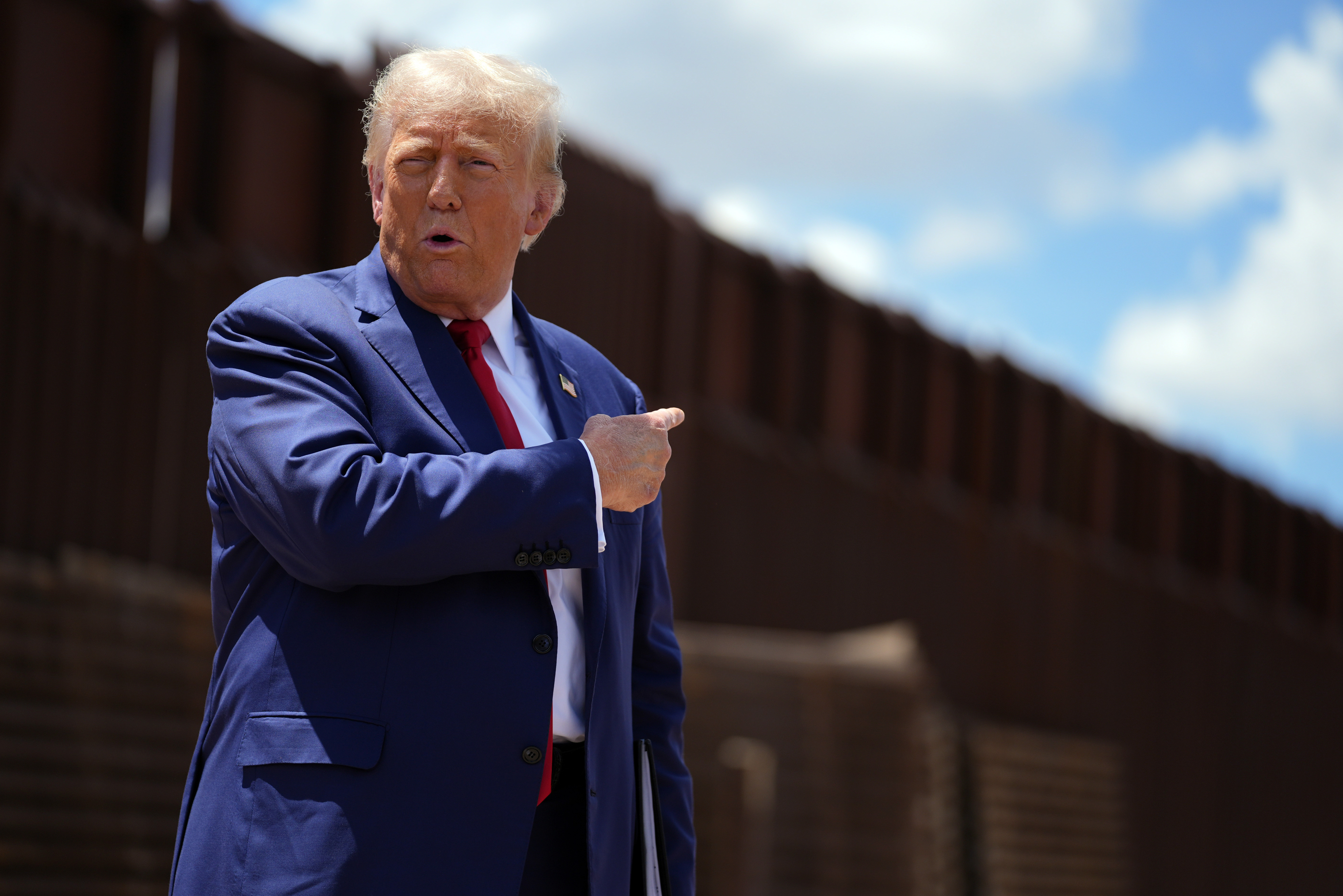 FILE - Republican presidential nominee former President Donald Trump speaks along the southern border with Mexico, on Aug. 22, 2024, in Sierra Vista, Ariz. (AP Photo/Evan Vucci, File)