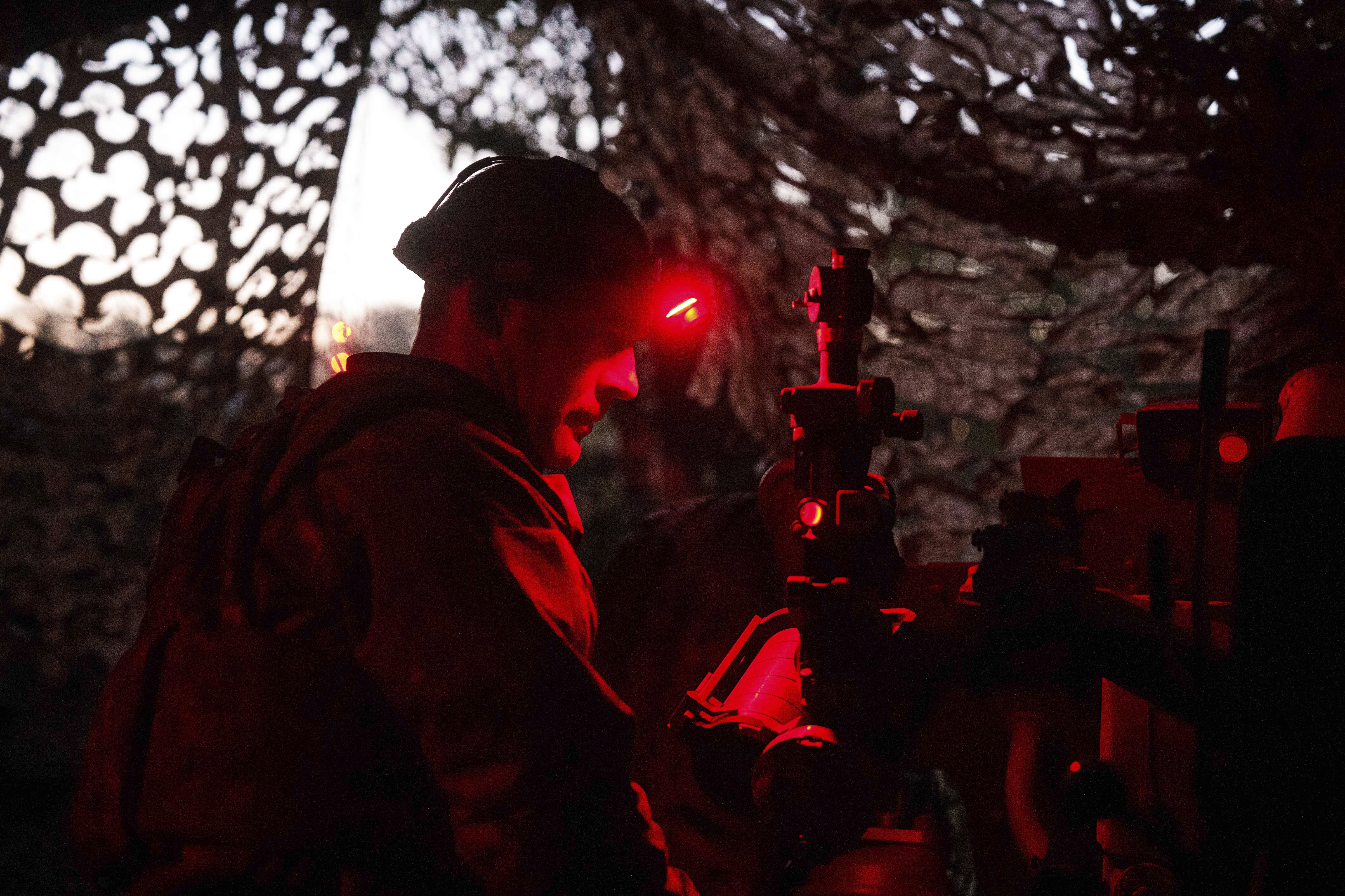 A Ukrainian serviceman of Liut brigade aims his D-30 artillery cannon during firing towards Russian positions near Toretsk, Donetsk region, Ukraine, Sunday Sept. 22, 2024. (AP Photo/Evgeniy Maloletka)