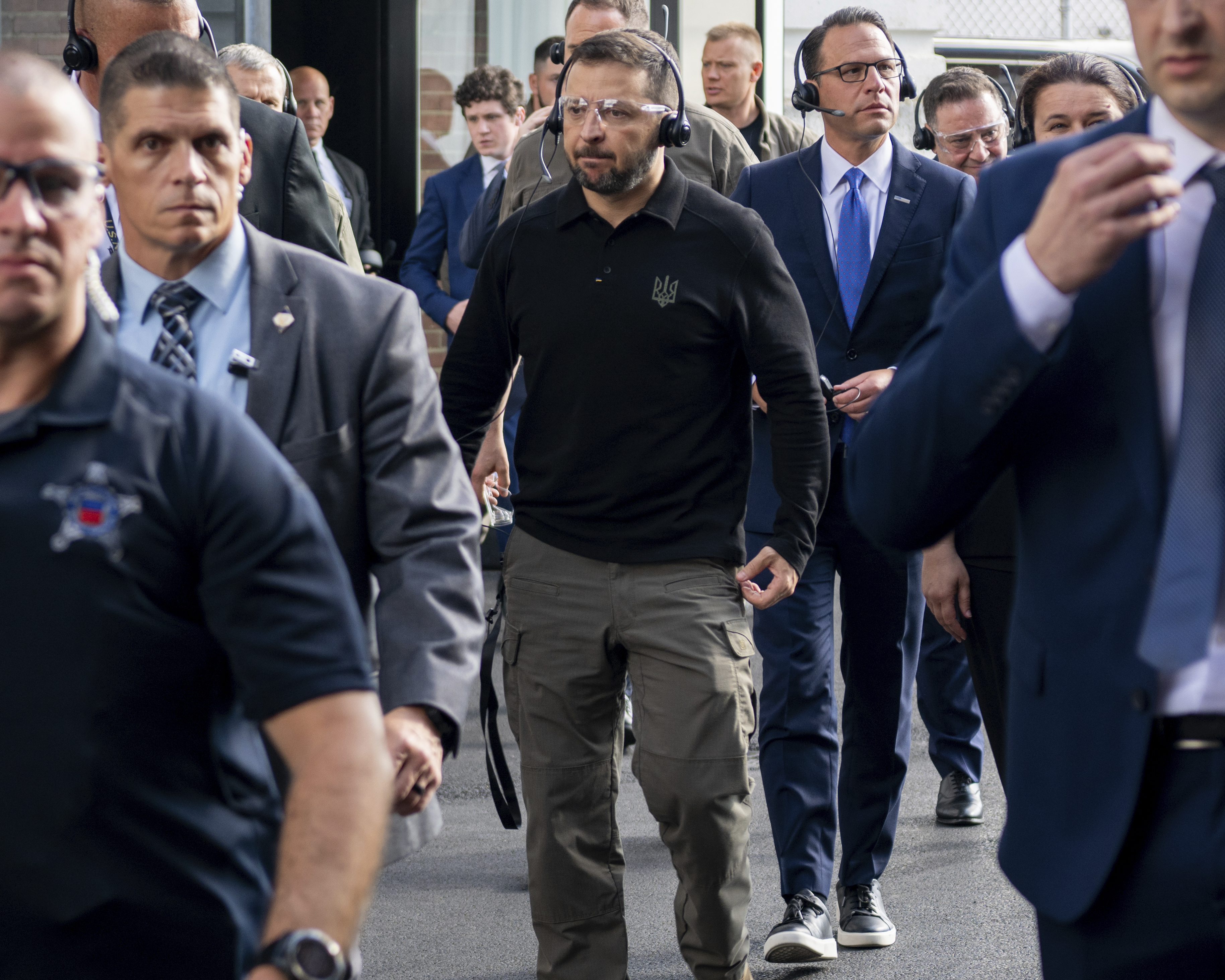 In this photo provided by the U.S. Army, Ukrainian President Volodymyr Zelenskyy, center, tours the Scranton Army Ammunition Plant in Scranton, Pa., Sunday, Sept. 22, 2024. (Staff Sgt. Deonte Rowell/U.S. Army via AP)